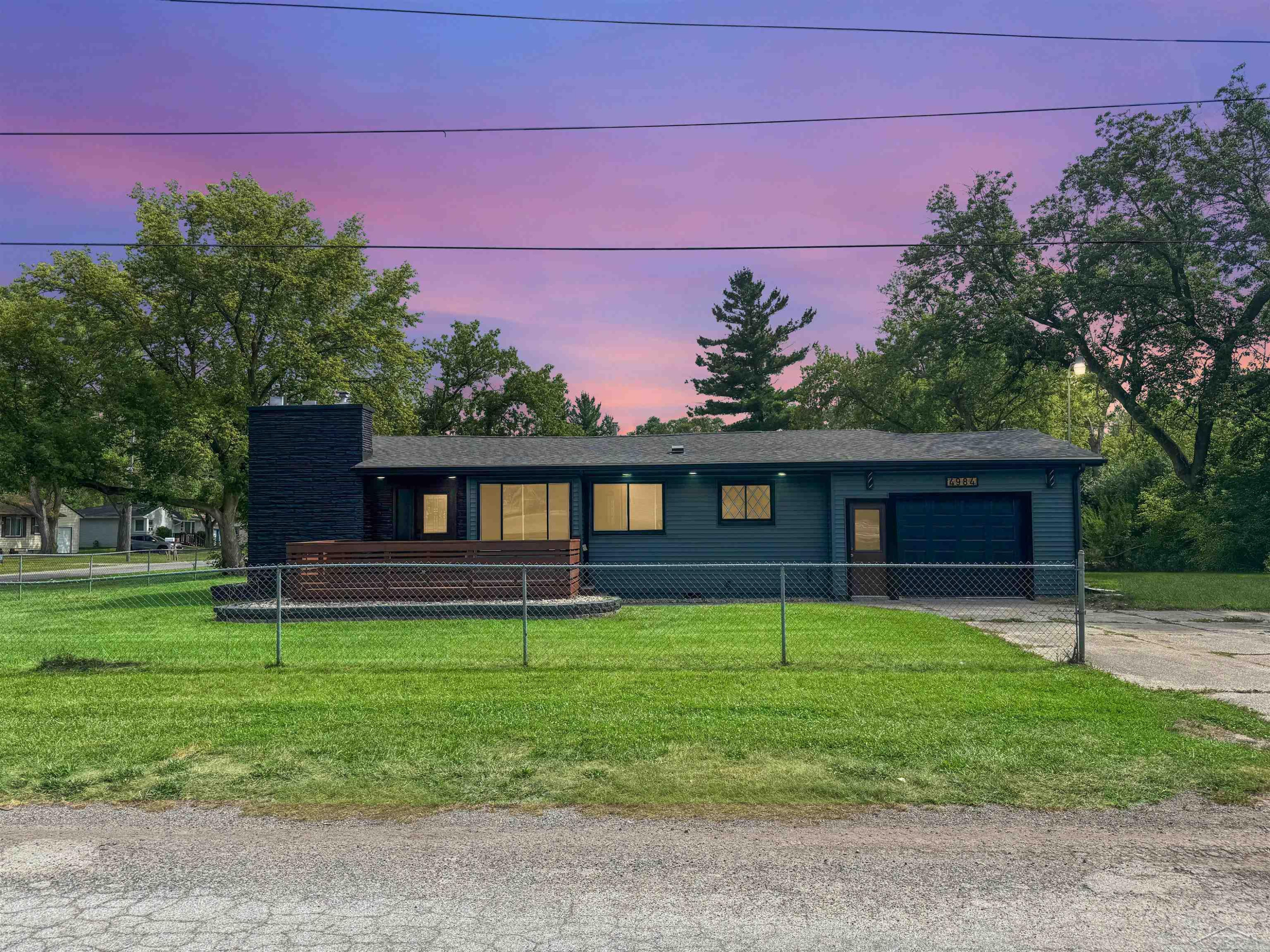 4984 Hull Road, MI 48601 — front exterior