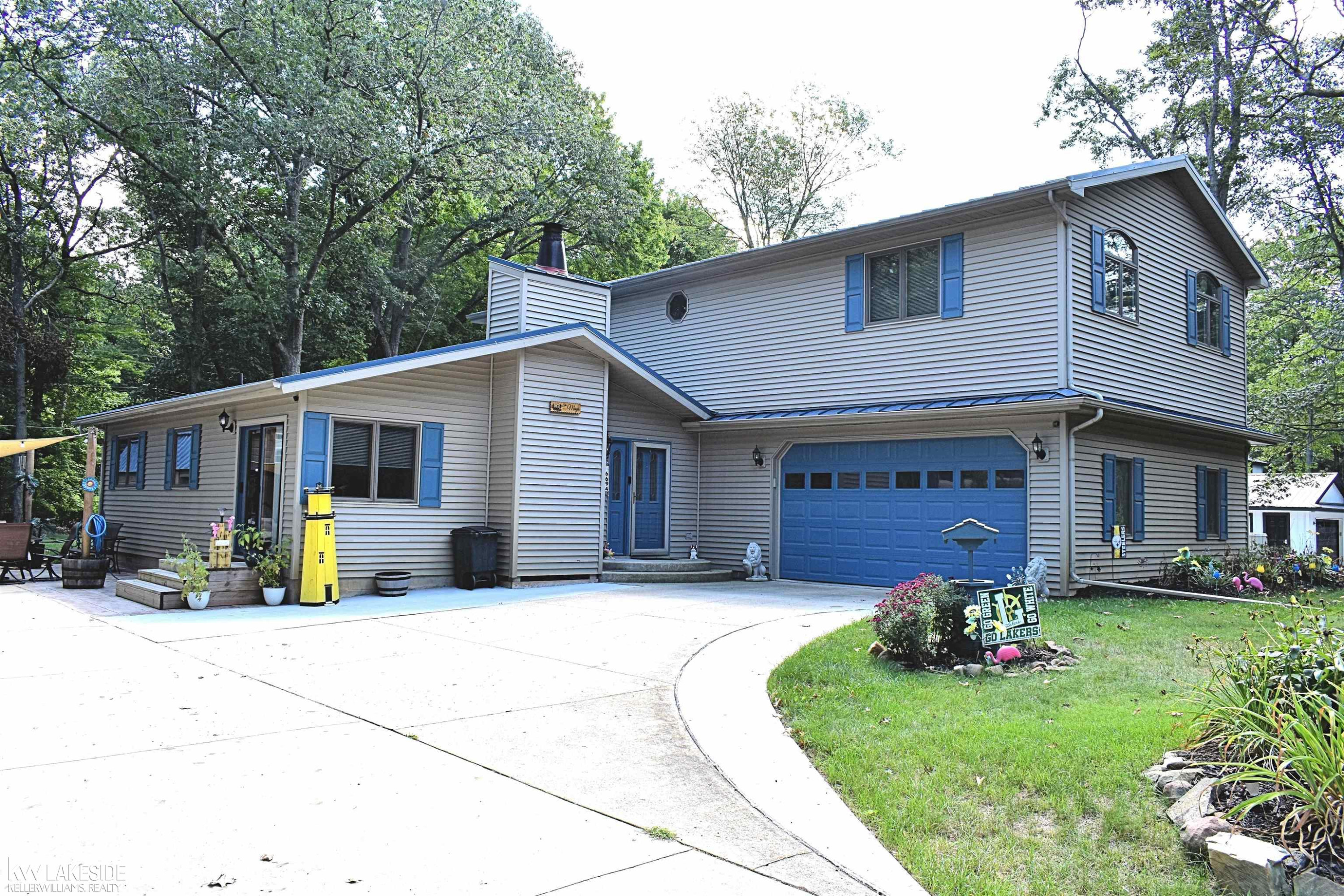 6694 Blake Drive, Caseville, MI 48725 — front exterior