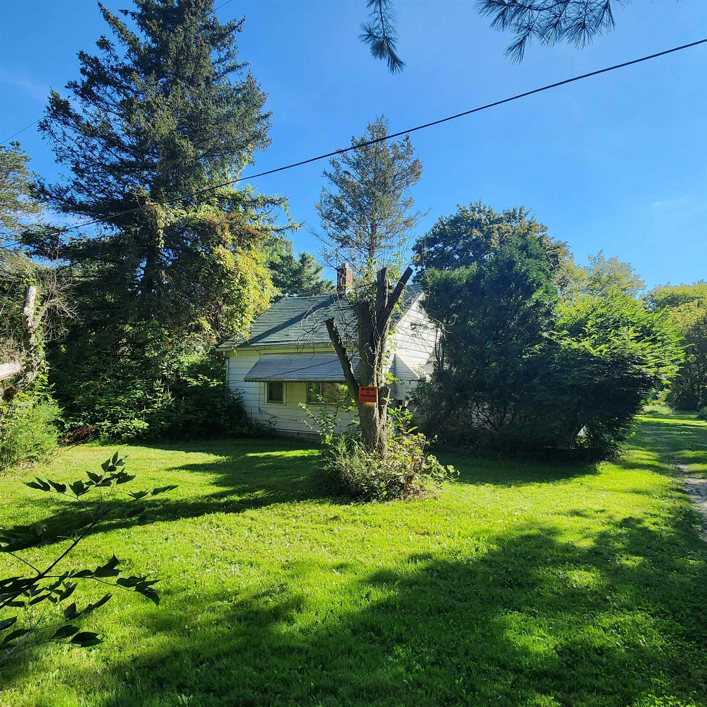 58450 Place Road, New Haven, MI 48048 — front exterior