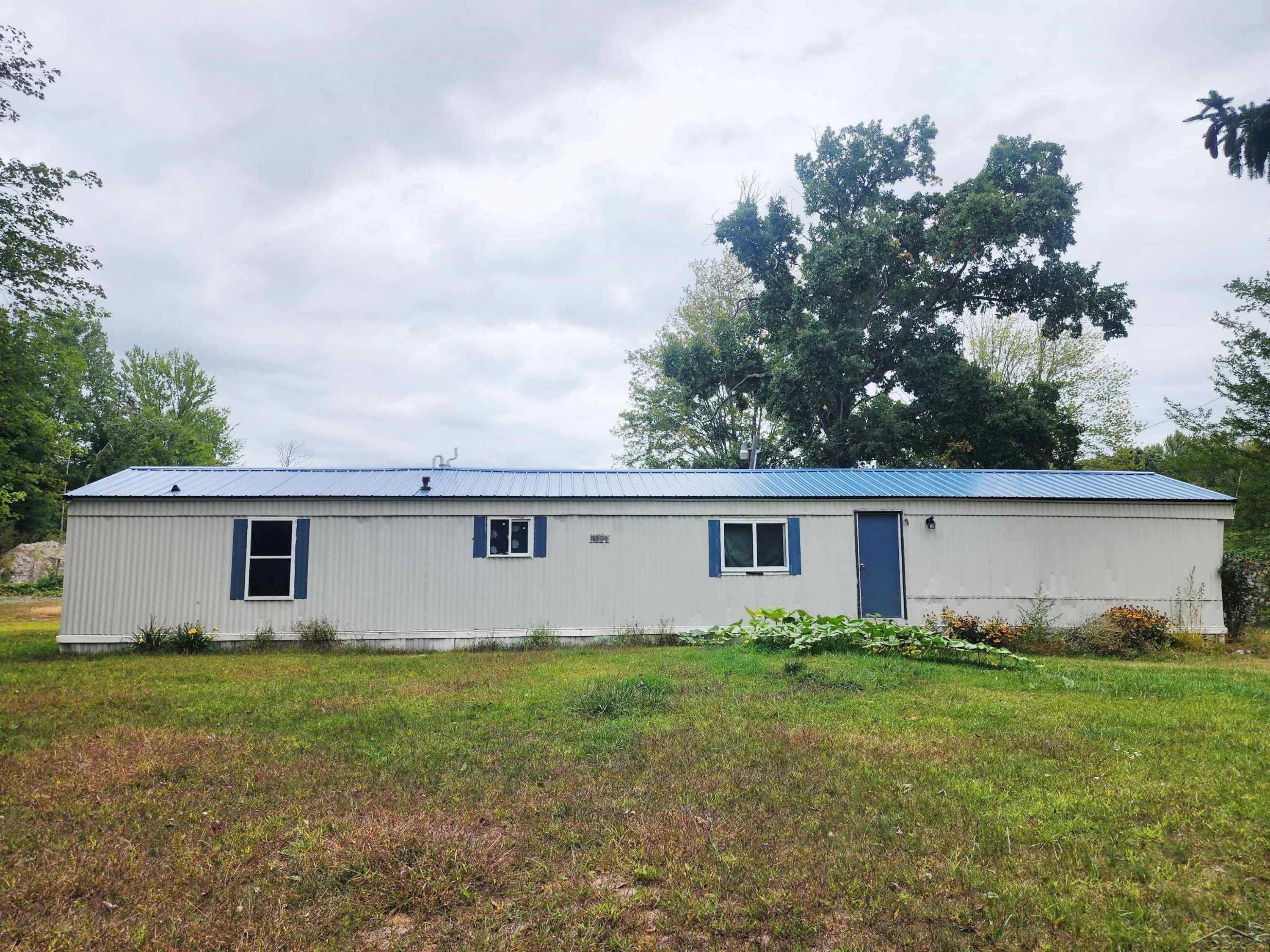 2156 W Cody Estey Road, Rhodes, MI 48652 — front exterior