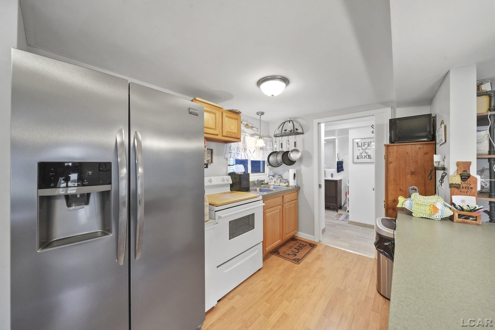 295 Grove Street, Manitou Beach, MI 49253 — Photo 16