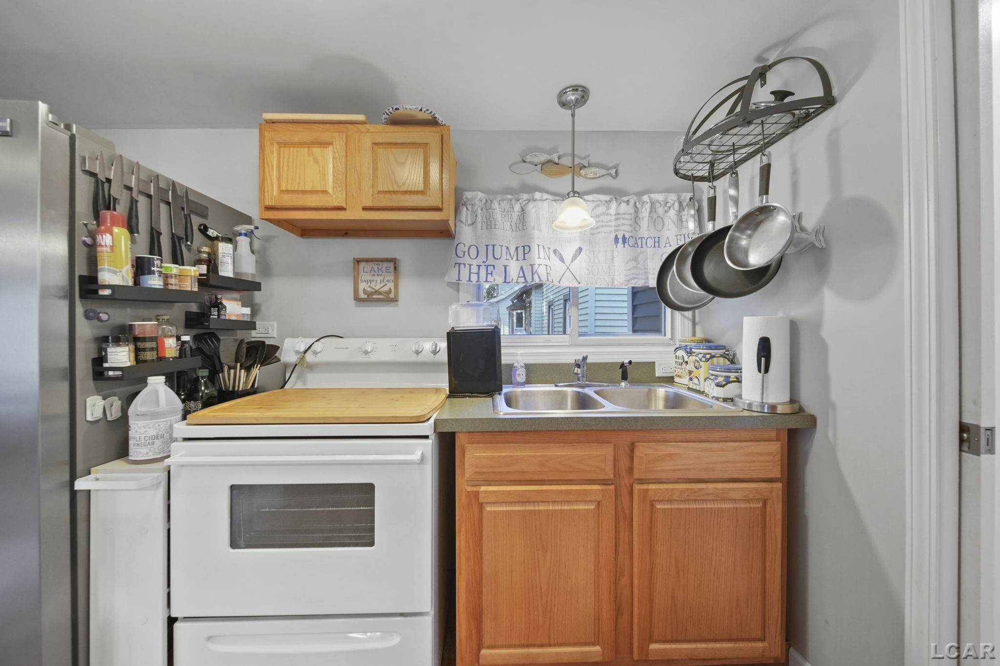 295 Grove Street, Manitou Beach, MI 49253 — Photo 17