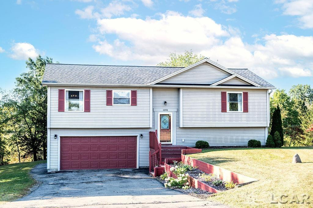 10440 Connemara Circle, Cement City, MI 49233 — front exterior