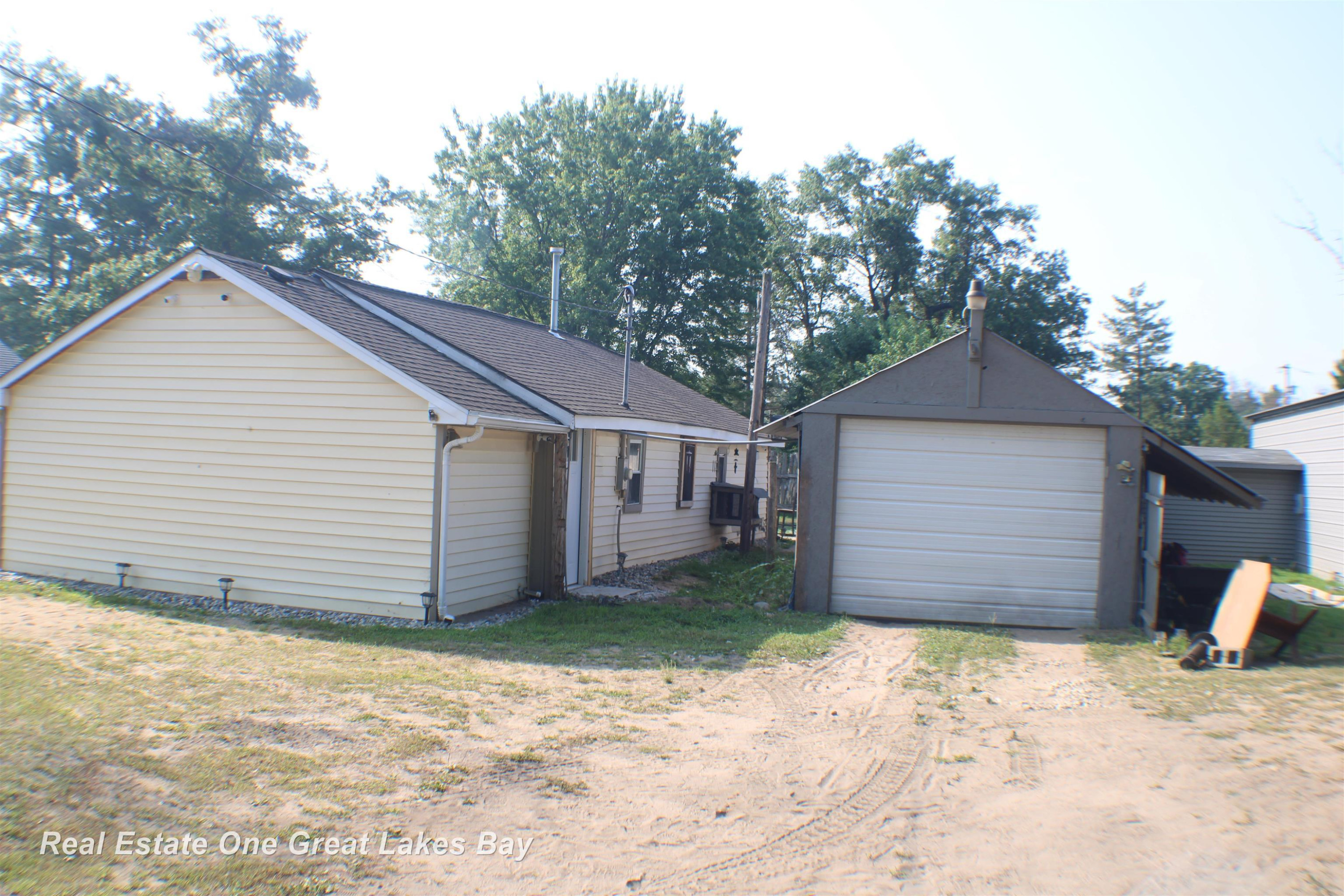 1714 Michael Drive, Alger, MI — front exterior