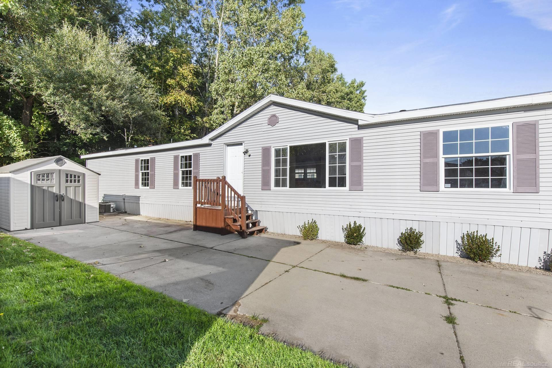 9386 Starboard Drive, MI — front exterior