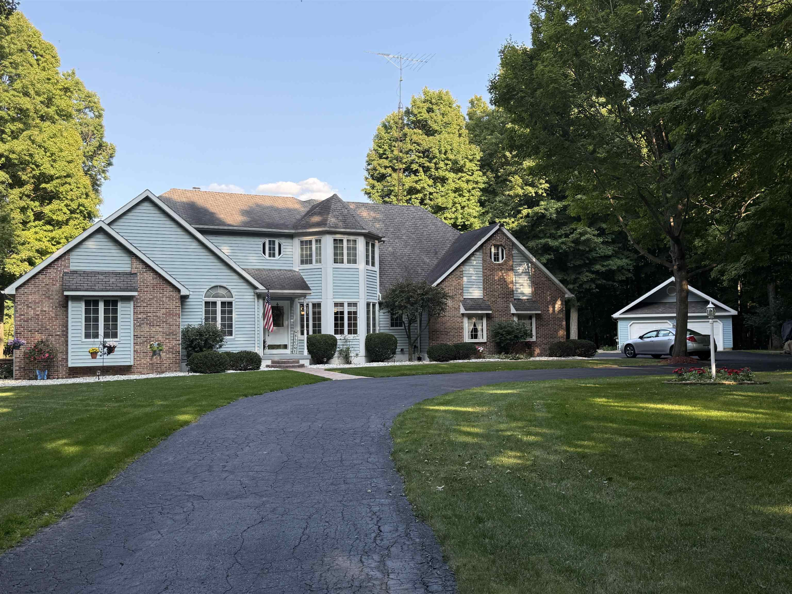1225 Sugarbush Drive, Lapeer, MI 48446 — front exterior