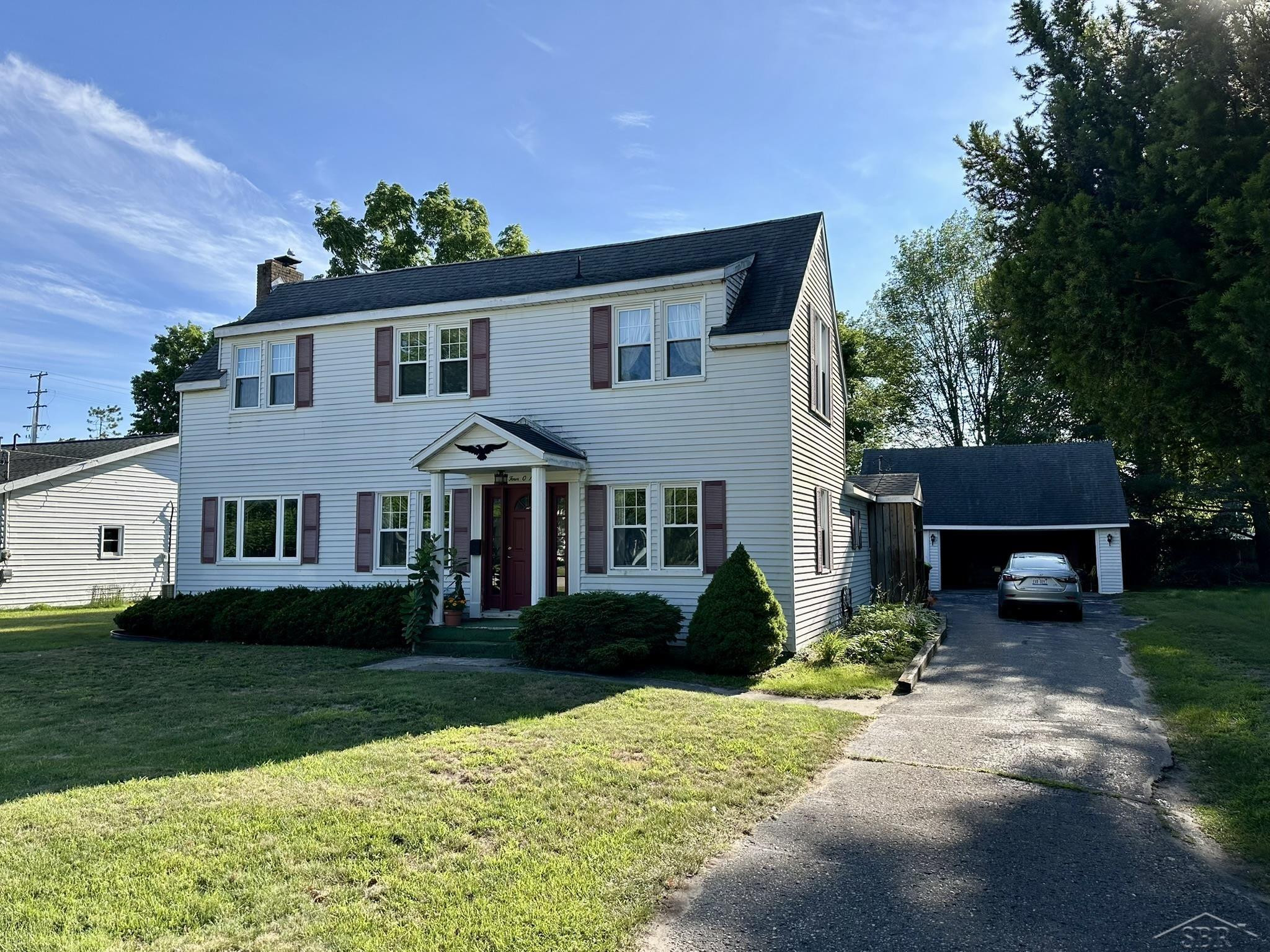 409 Smith Street, East Tawas, MI 48730 — front exterior