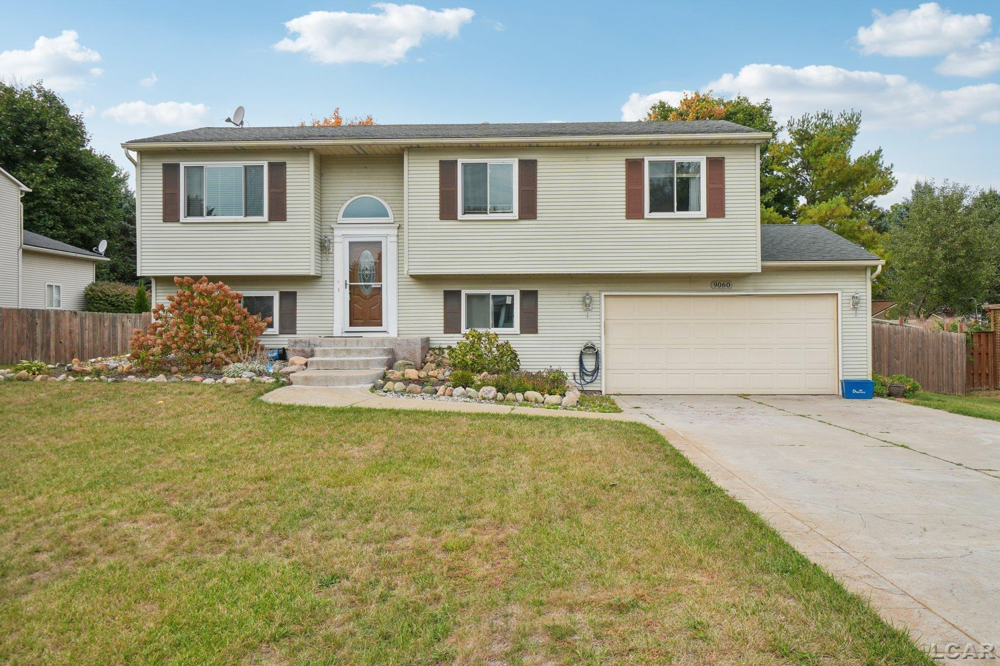 9060 Wildwood Lake Drive, Whitmore Lake, MI 48189 — front exterior