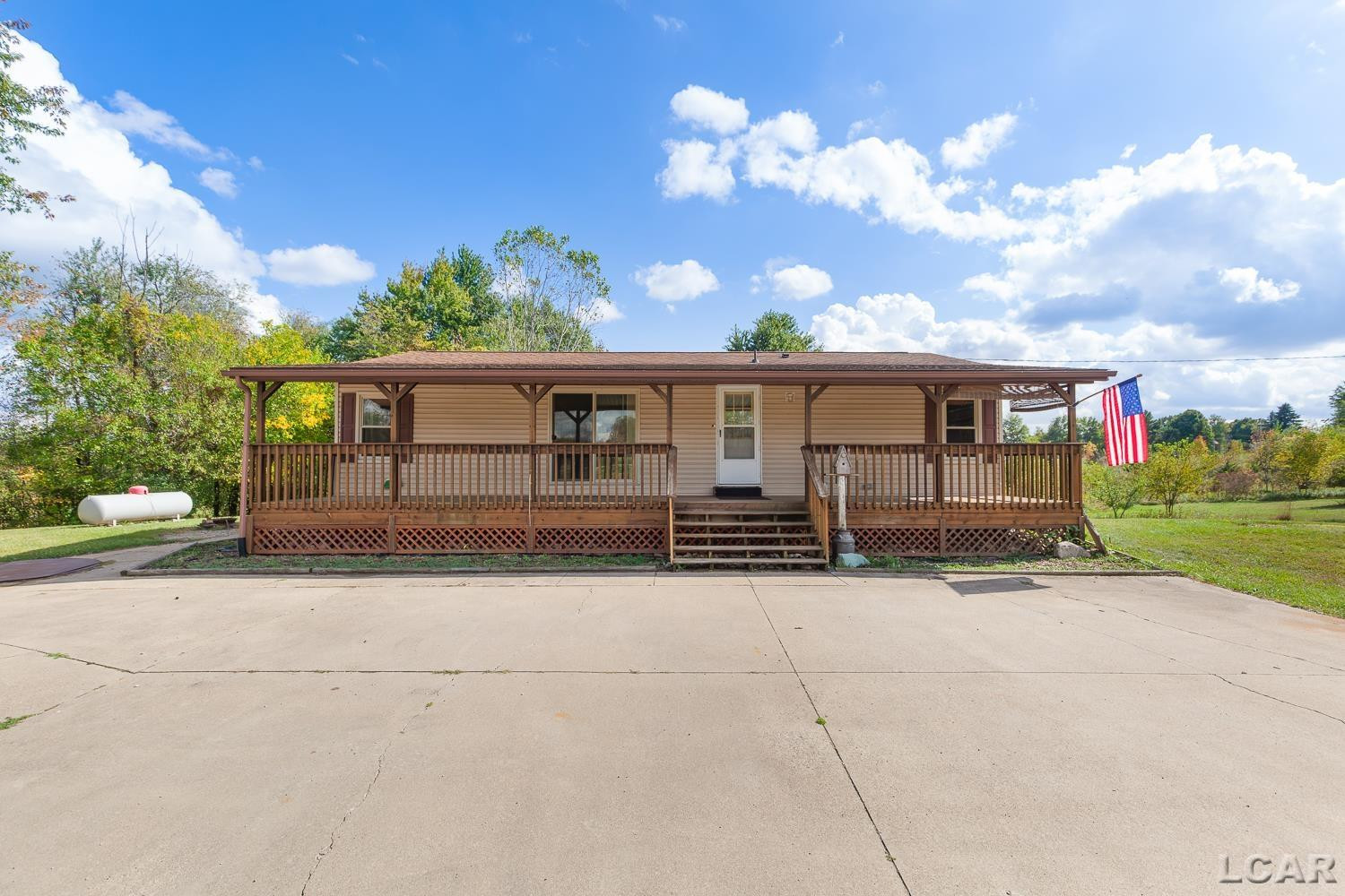 3051 S Kelso Road, Pittsford, MI 49271 — front exterior