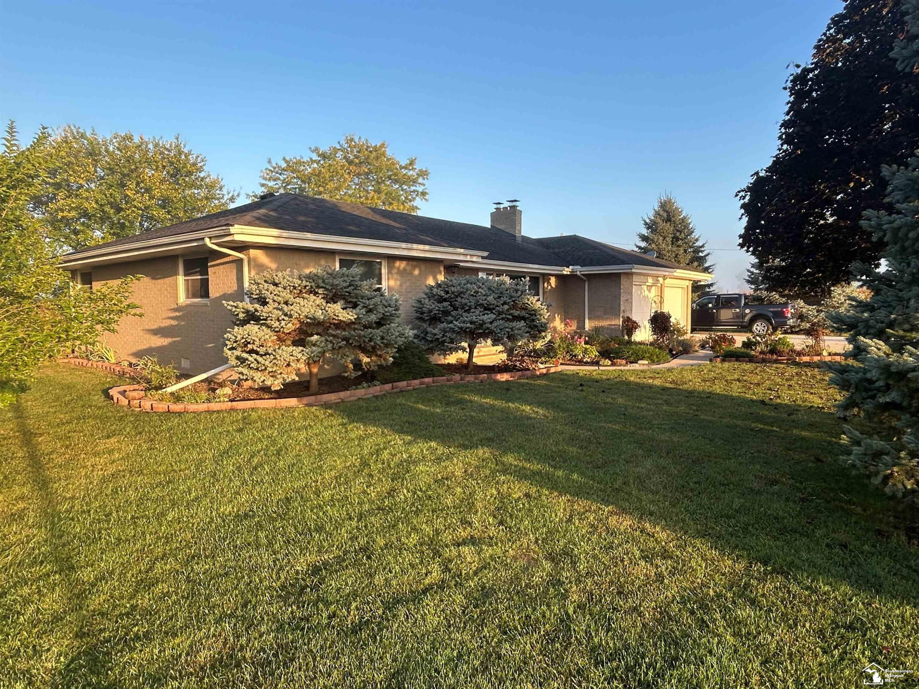 7825 Sylvania-Petersburg Road, MI 49267 — front exterior