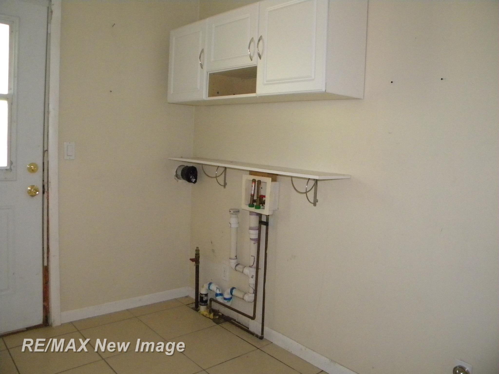 667 E Whitethorn Drive, Midland, MI 48640 — Photo 17