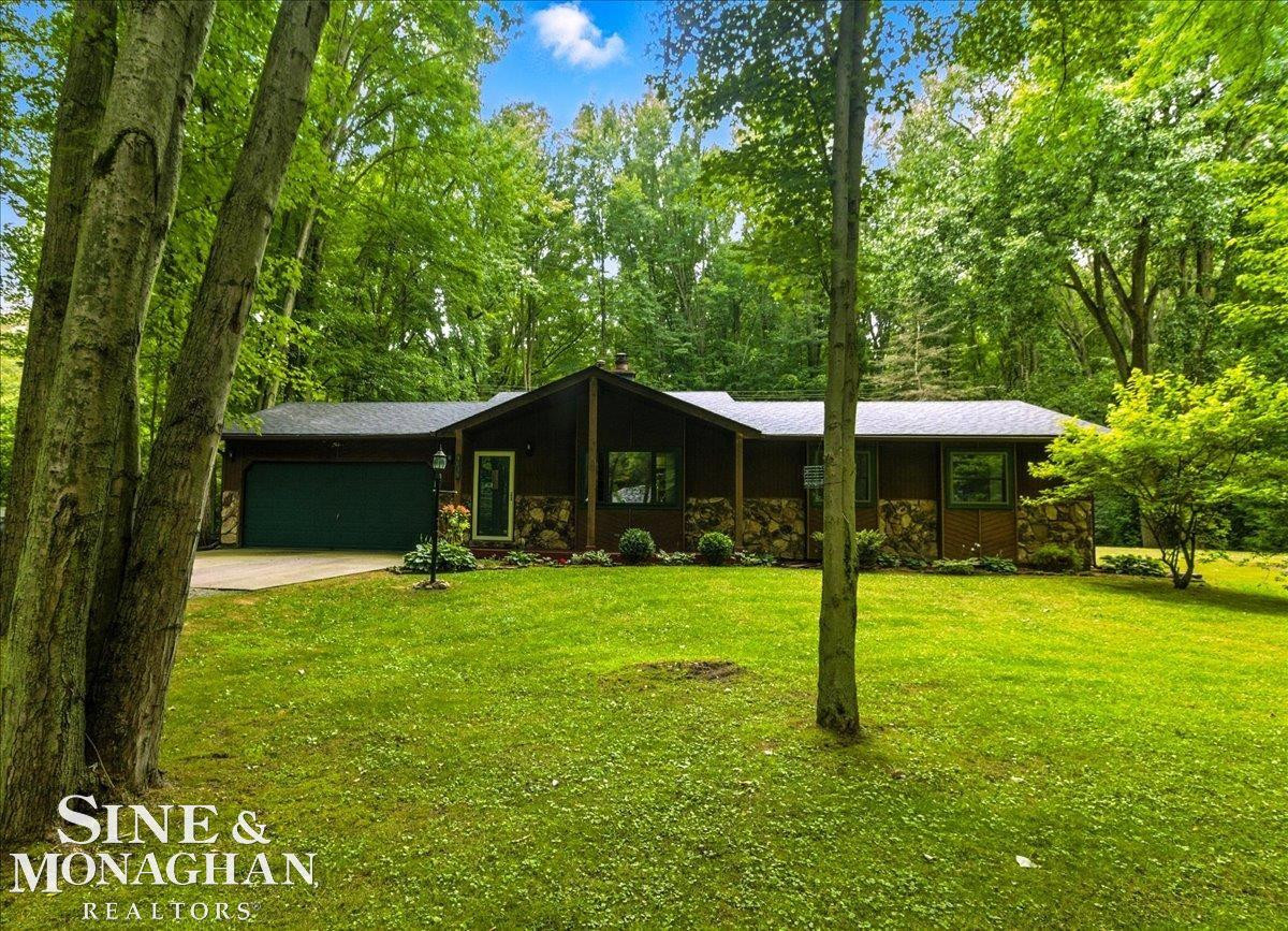 9038 Stone Road, MI 48001 — front exterior