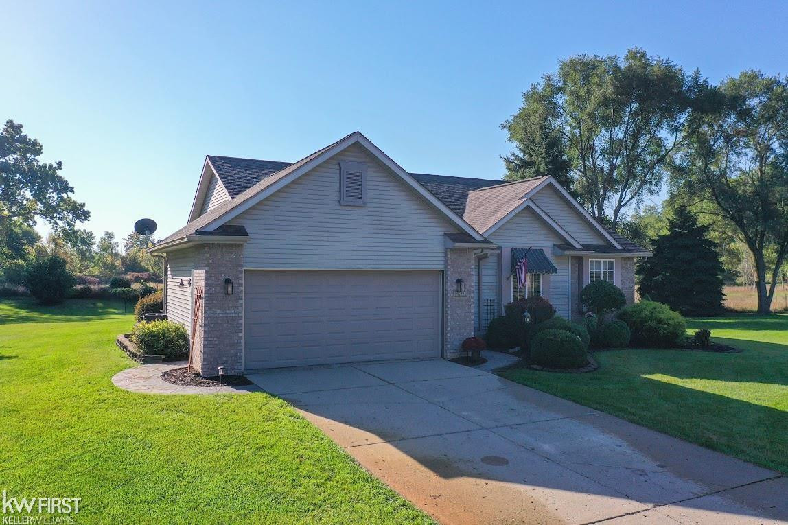 2433 Fenton Creek Lane, Fenton, MI 48430 — front exterior