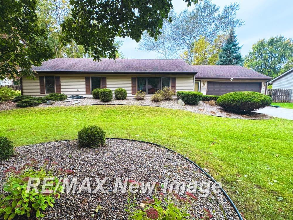 221 Sycamore Lane, Auburn, MI 48611 — front exterior