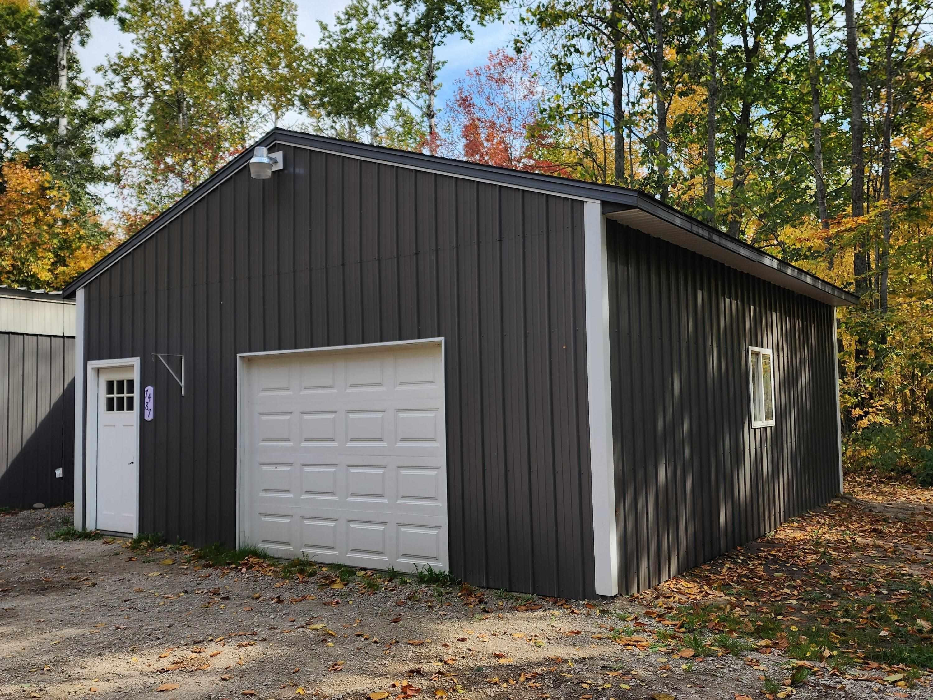 7487 Ashcroft Drive, Mancelona, MI 49659 — Photo 5