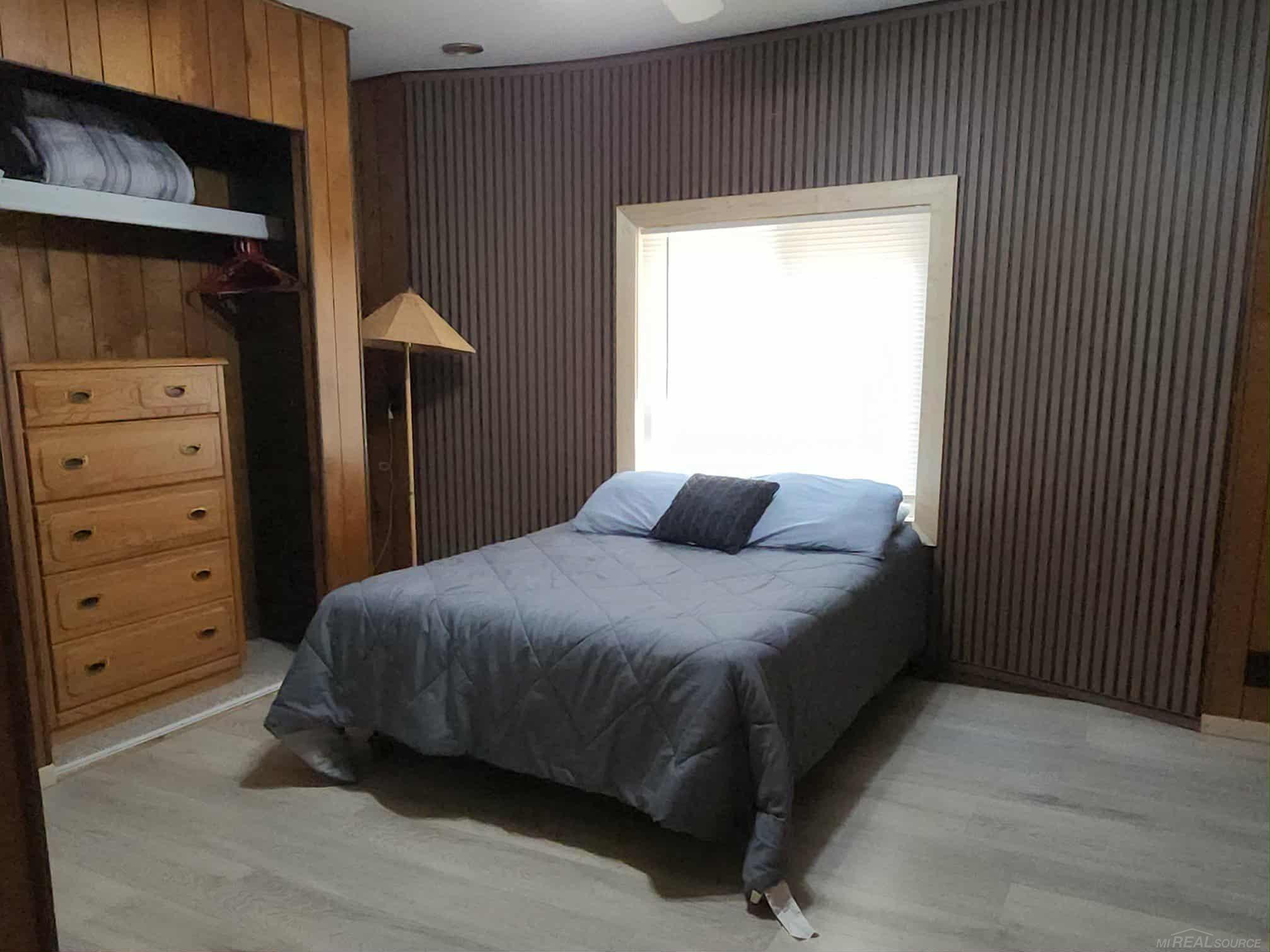 7487 Ashcroft Drive, Mancelona, MI 49659 — Photo 14