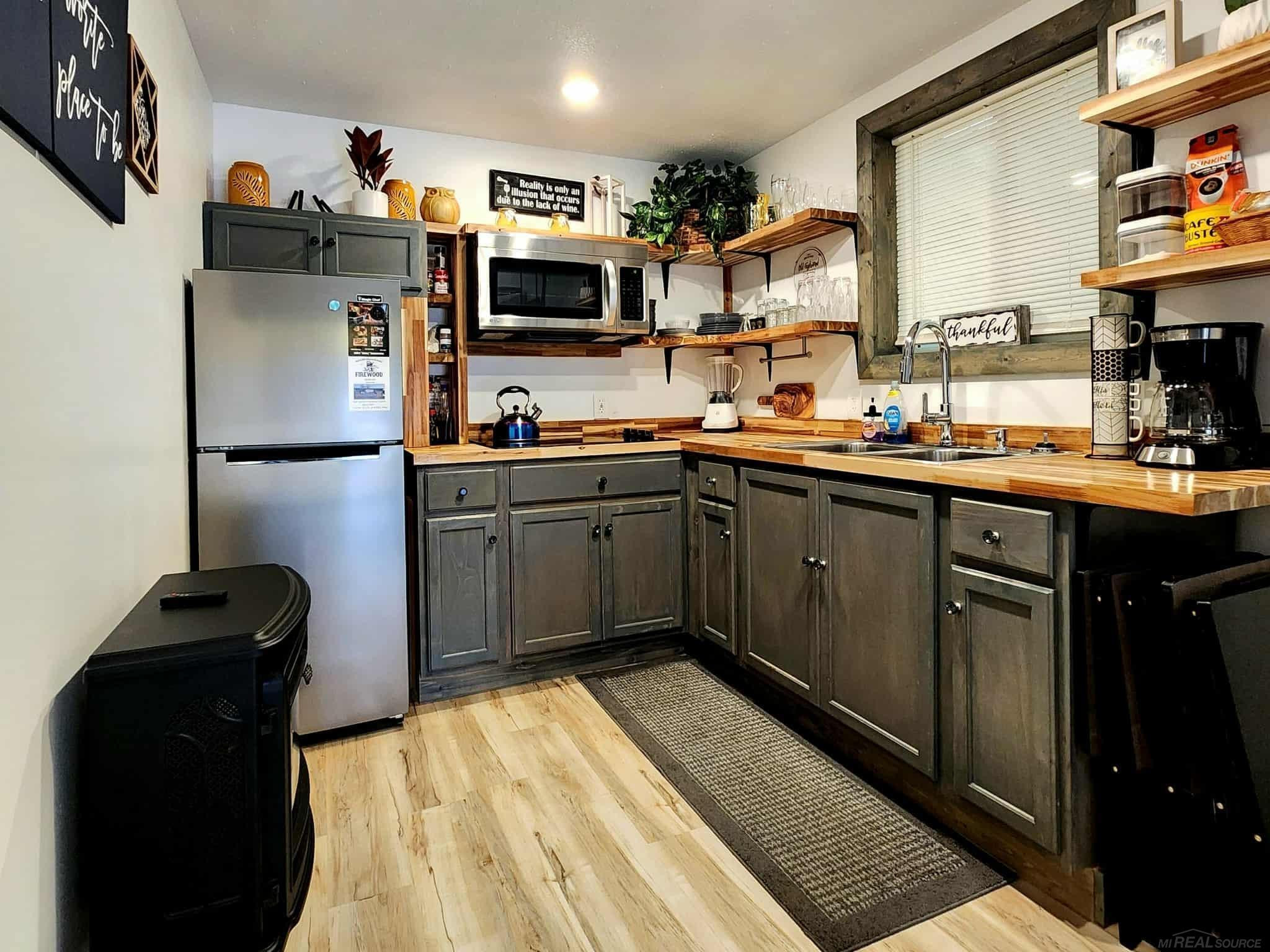 7487 Ashcroft Drive, Mancelona, MI 49659 — Photo 29