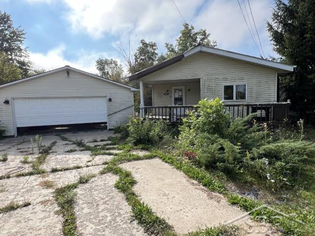 9013 S Shepherd Road, Shepherd, MI 48883 — front exterior