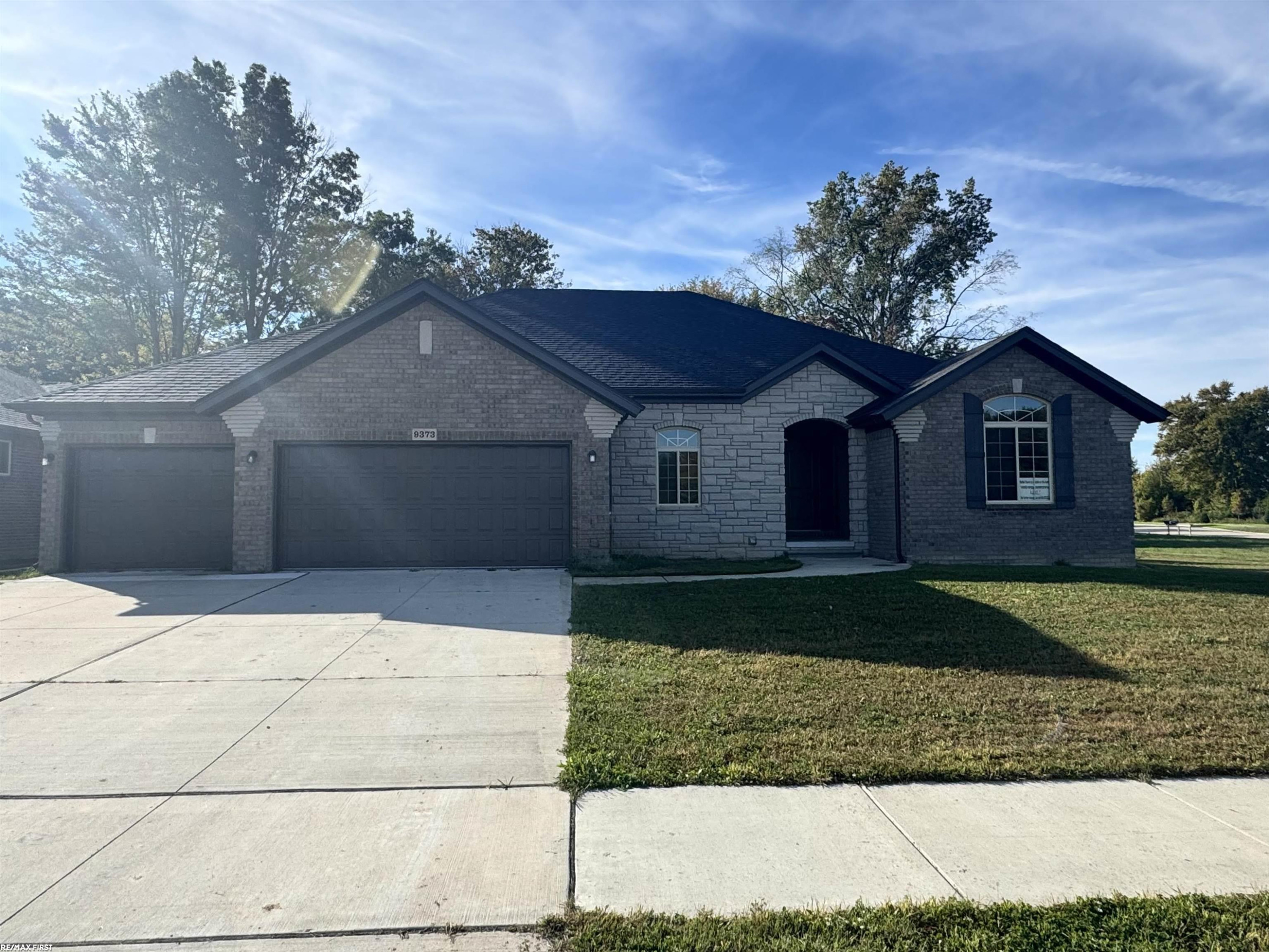 9373 Whistling Duck Drive, MI — front exterior