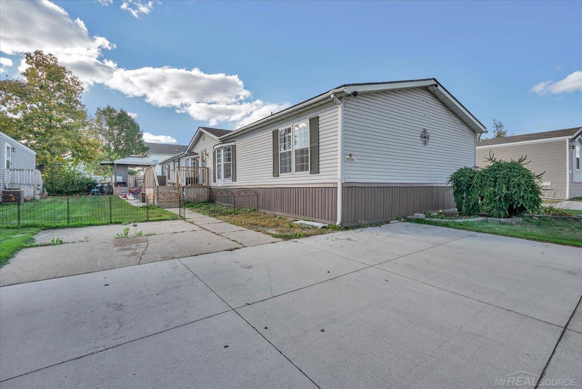 57561 Meadow Drive, New Haven, MI 48048 — front exterior