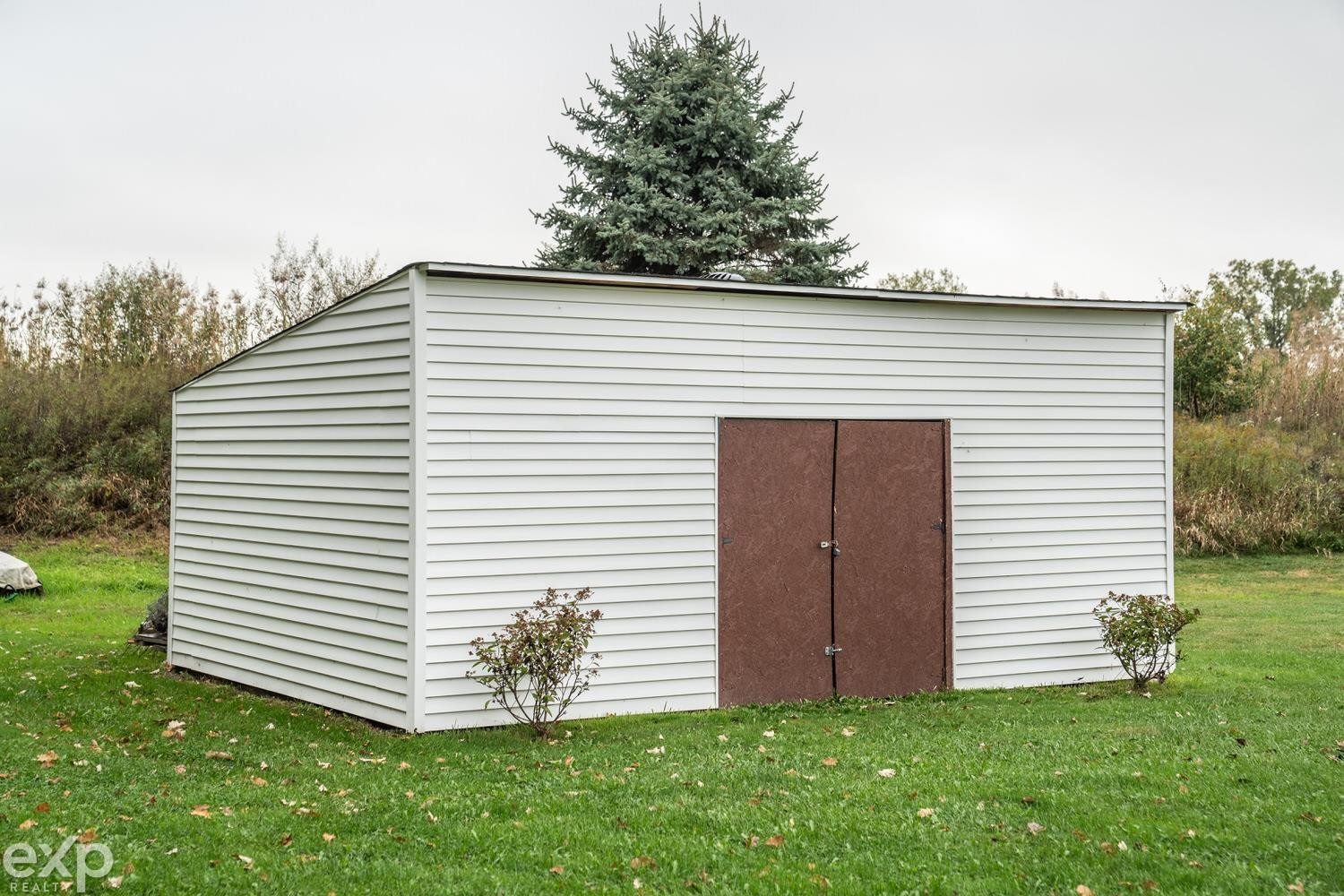 7084 Marsh Road, MI — Photo 42