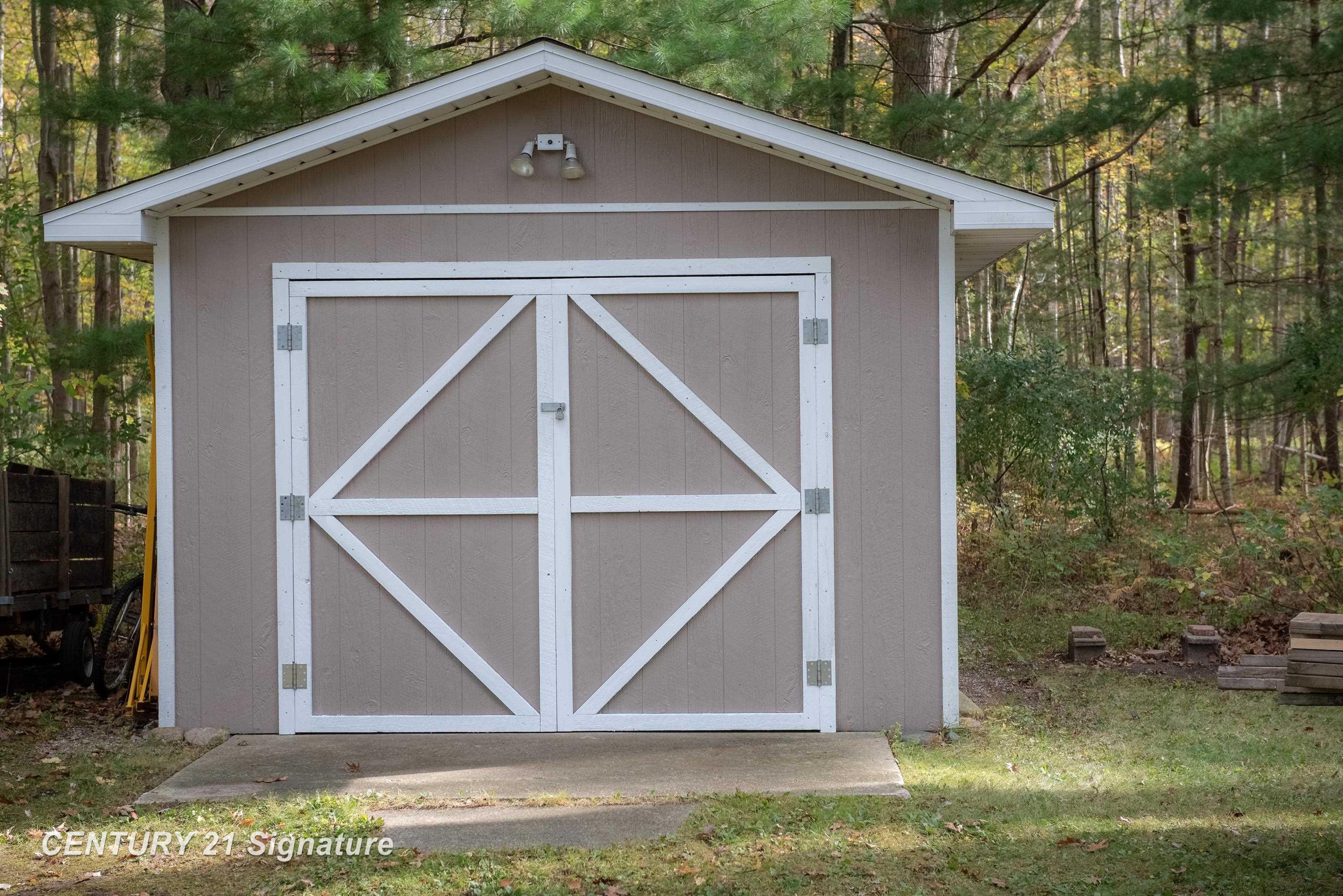 671 S Woodcock Road, Midland, MI 48640 — Photo 30