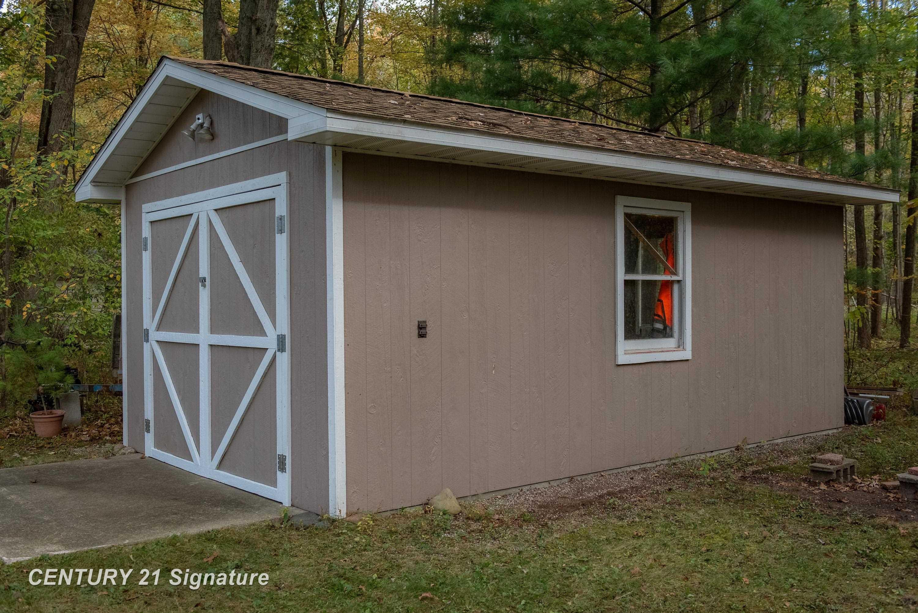 671 S Woodcock Road, Midland, MI 48640 — Photo 31
