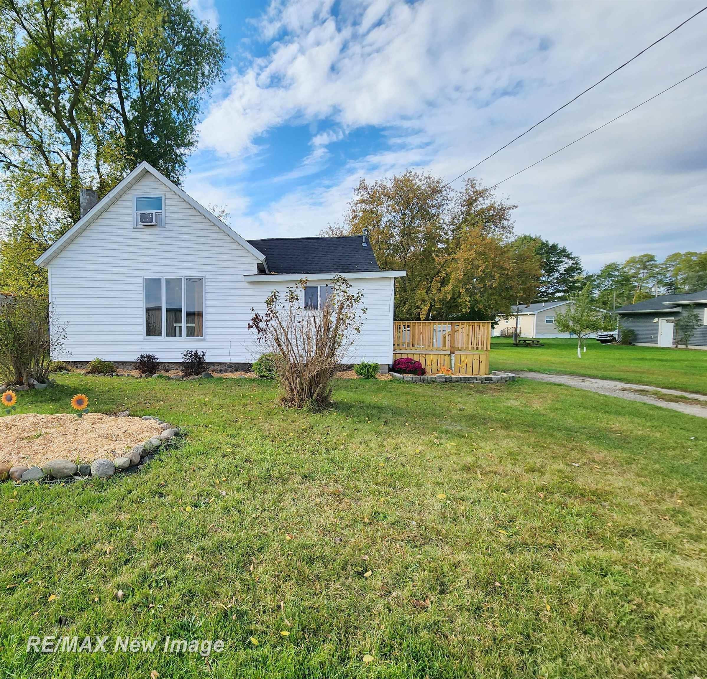 306 E Webster Street, Coleman, MI 48618 — front exterior