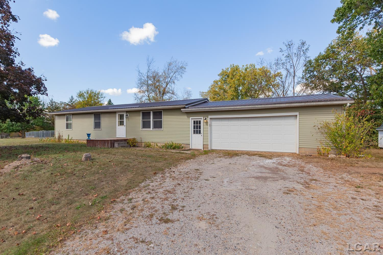 4010 Nokomis Trail, Osseo, MI 49266 — front exterior