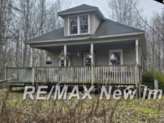 5911 N Water Street, Sanford, MI 48657 — front exterior