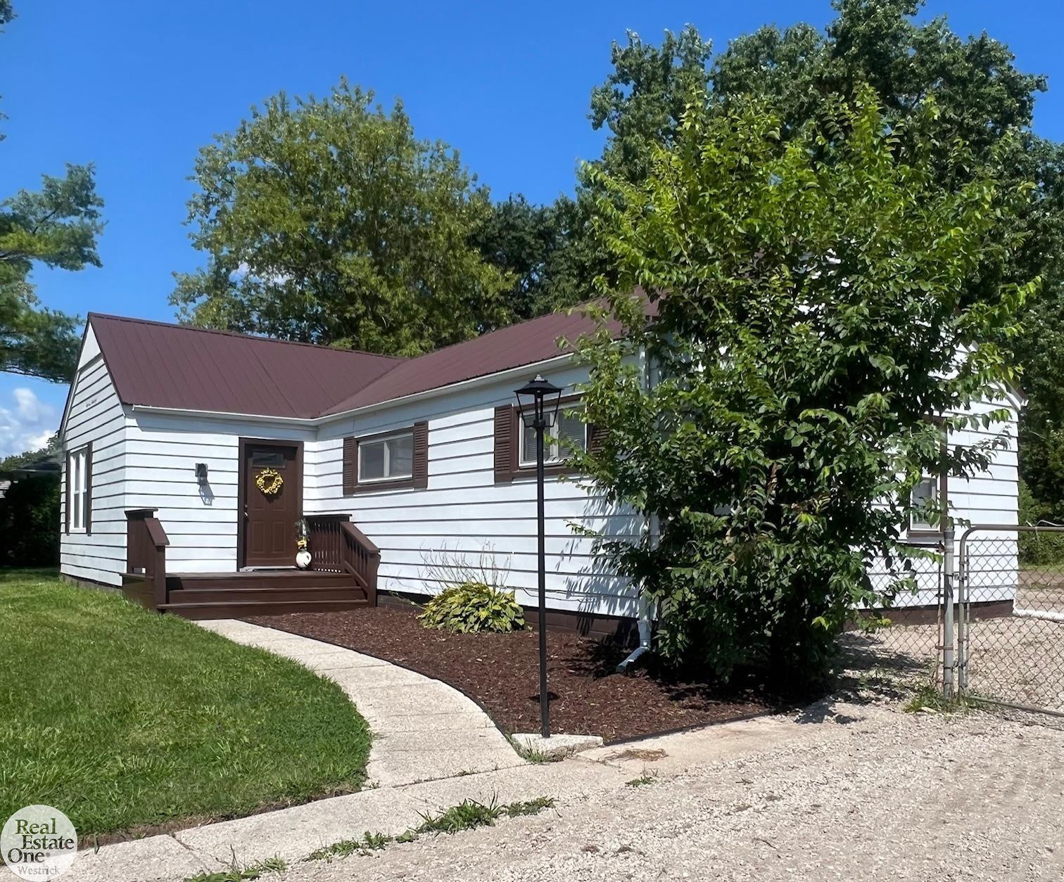 6928 Lapeer Road, MI 48049 — front exterior