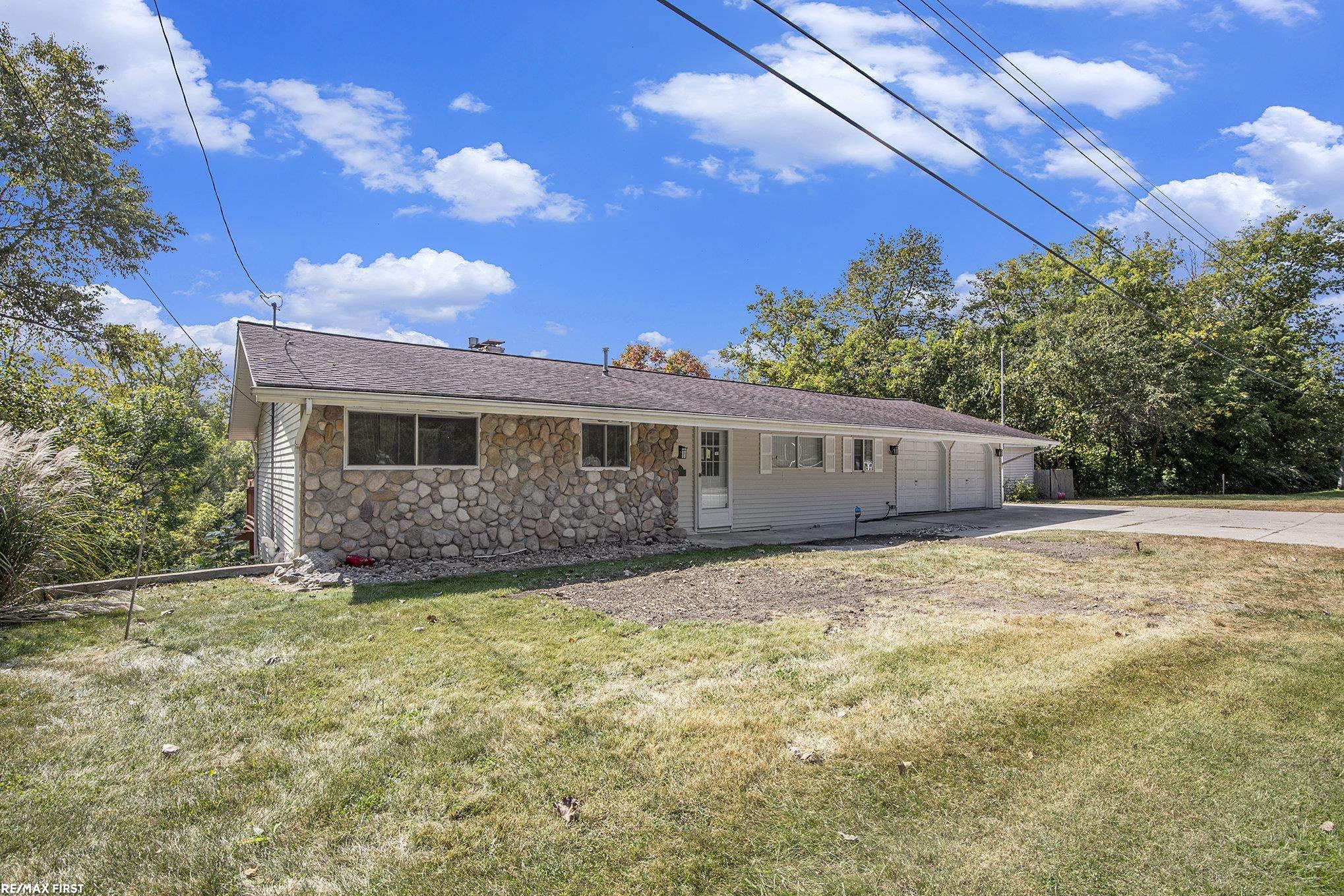 4167 N River Rd Street, MI 48059 — front exterior