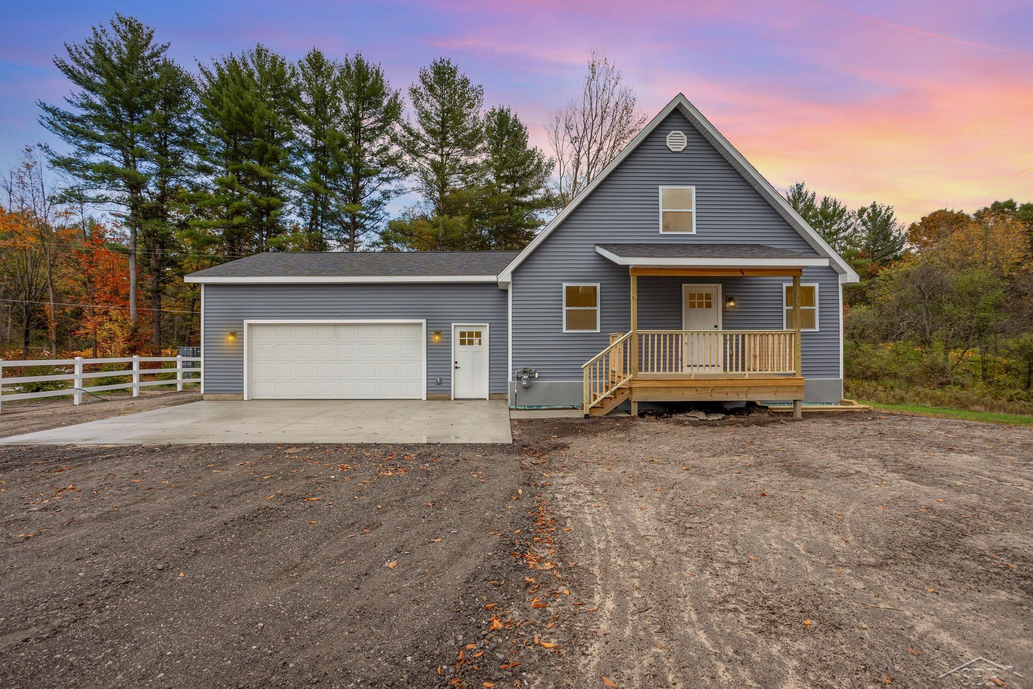 1954 N Five Mile Road, Sanford, MI 48657 — front exterior