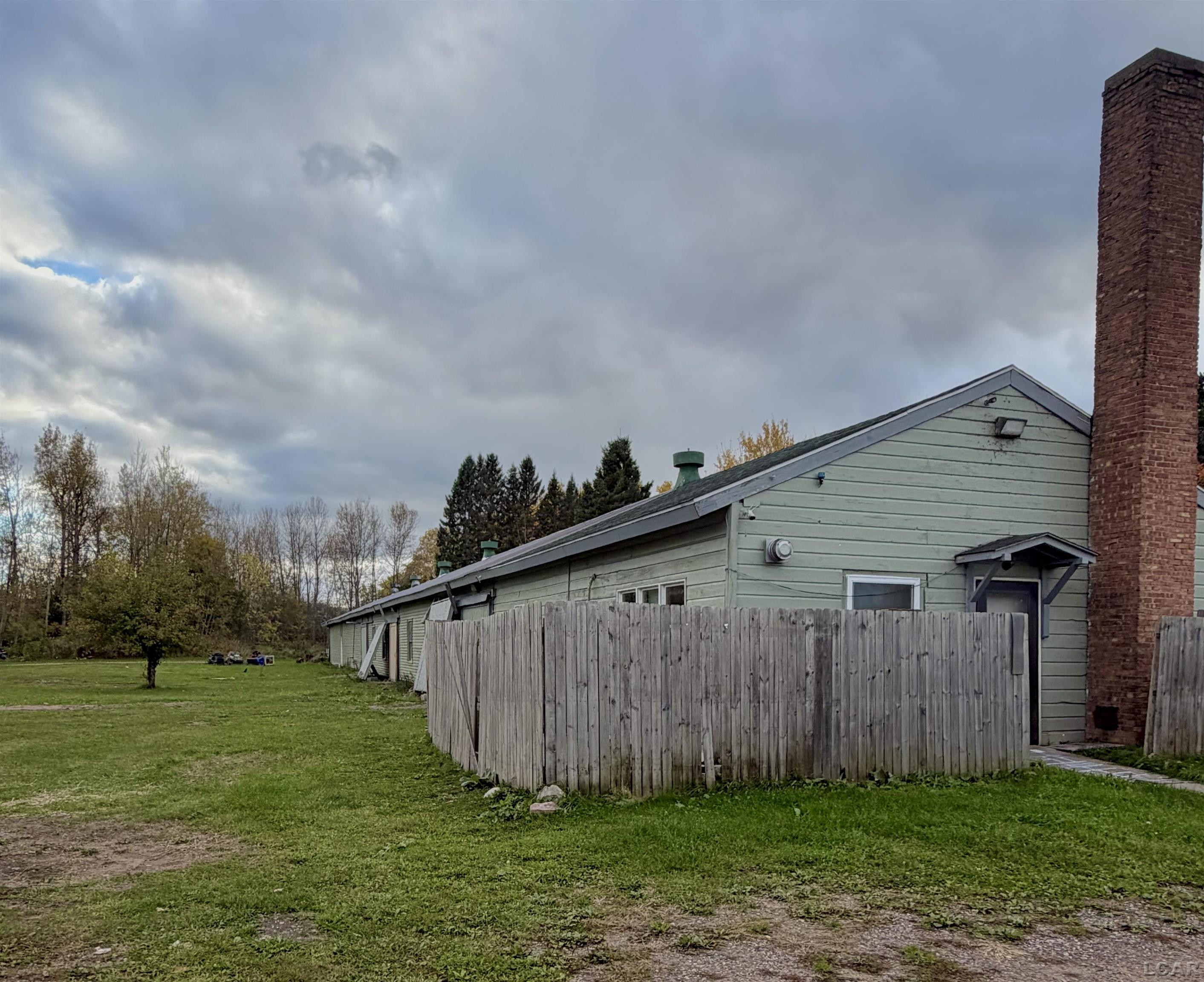 W 9th Street, MI 49783 — front exterior