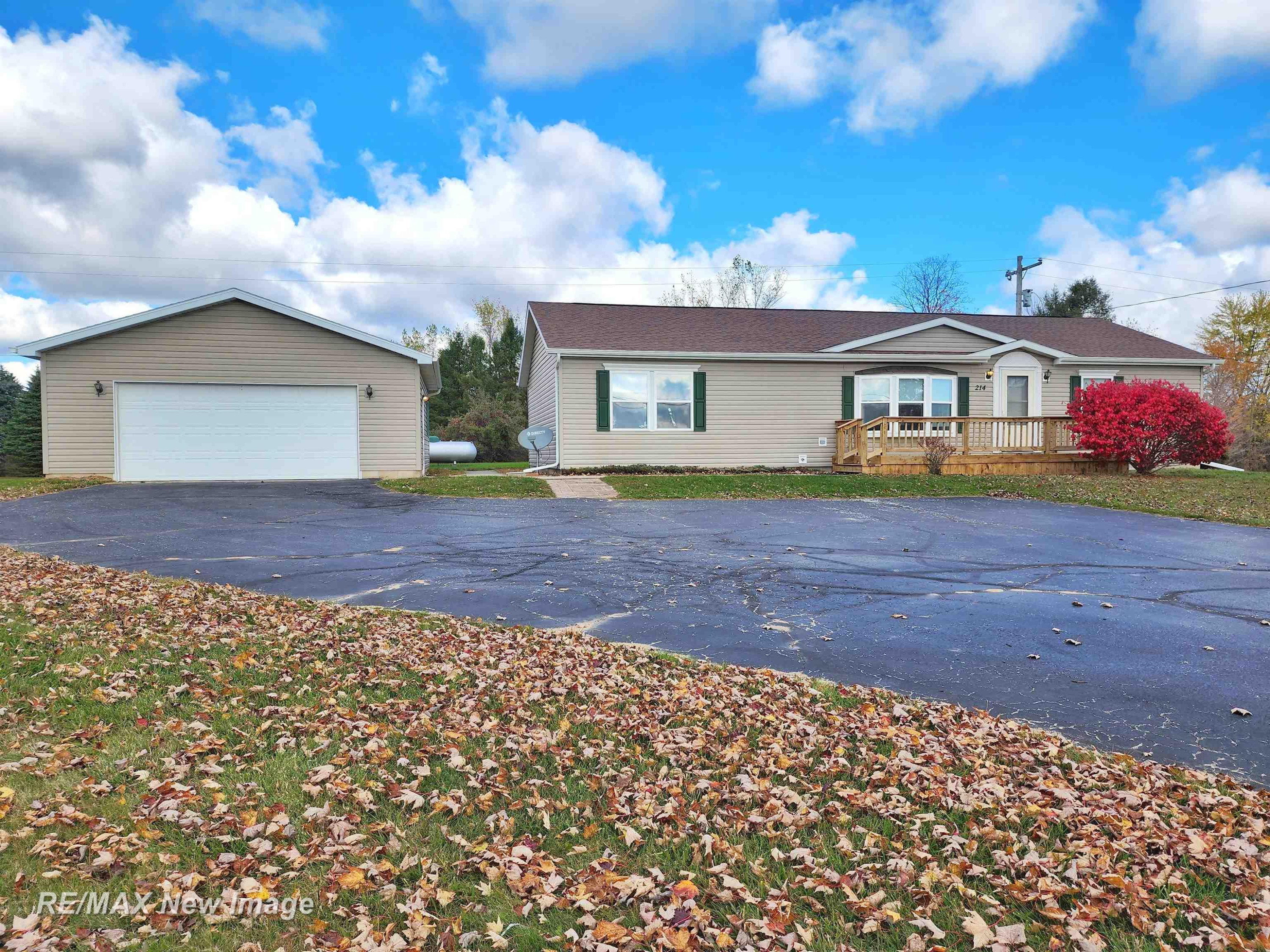 214 W Pinconning Road, Pinconning, MI 48650 — front exterior