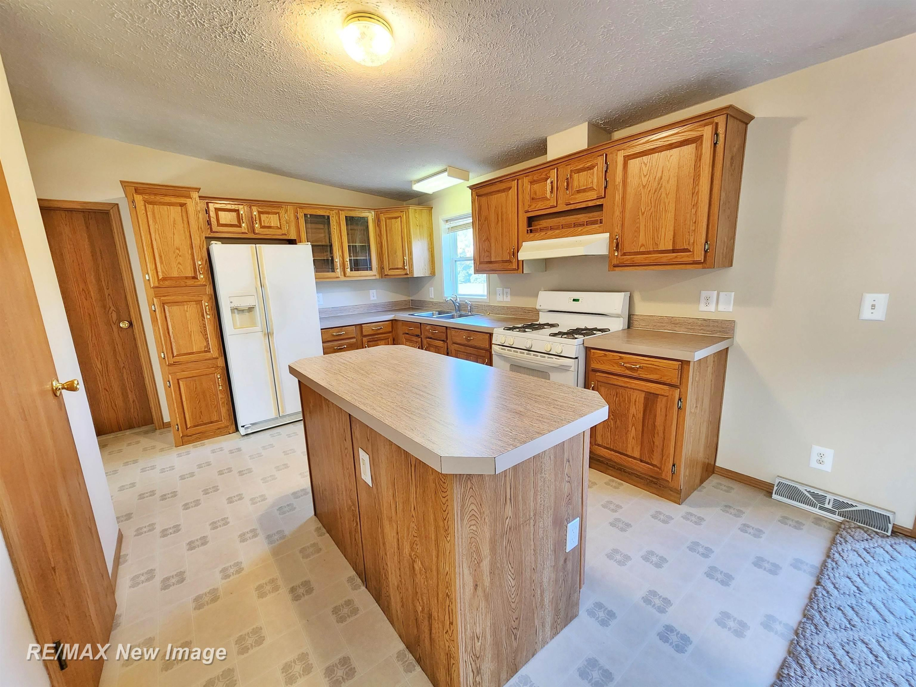 214 W Pinconning Road, Pinconning, MI 48650 — Photo 11