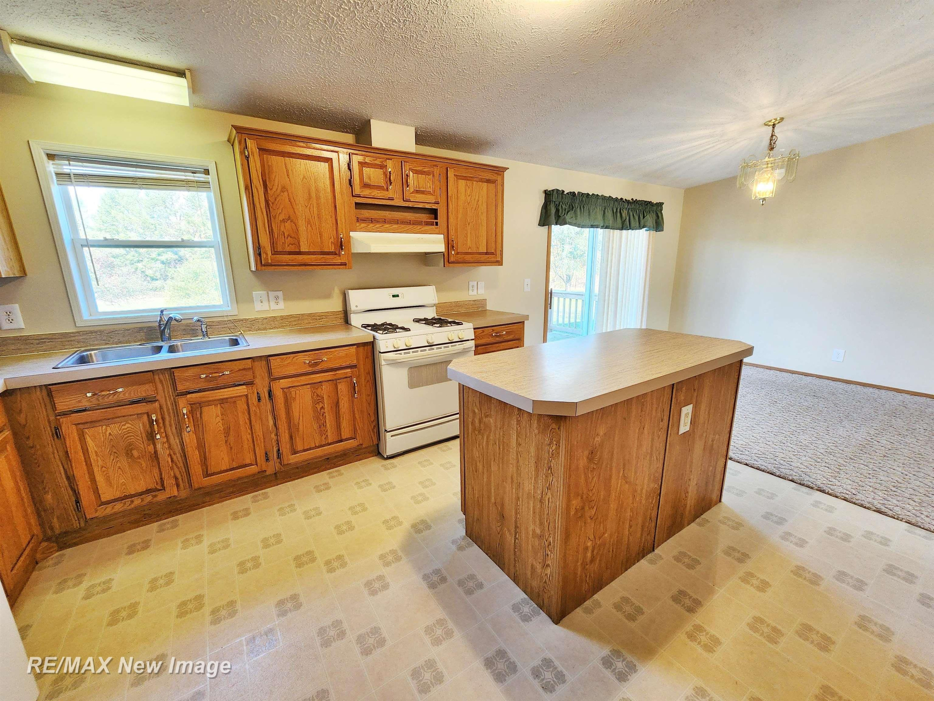 214 W Pinconning Road, Pinconning, MI 48650 — Photo 13