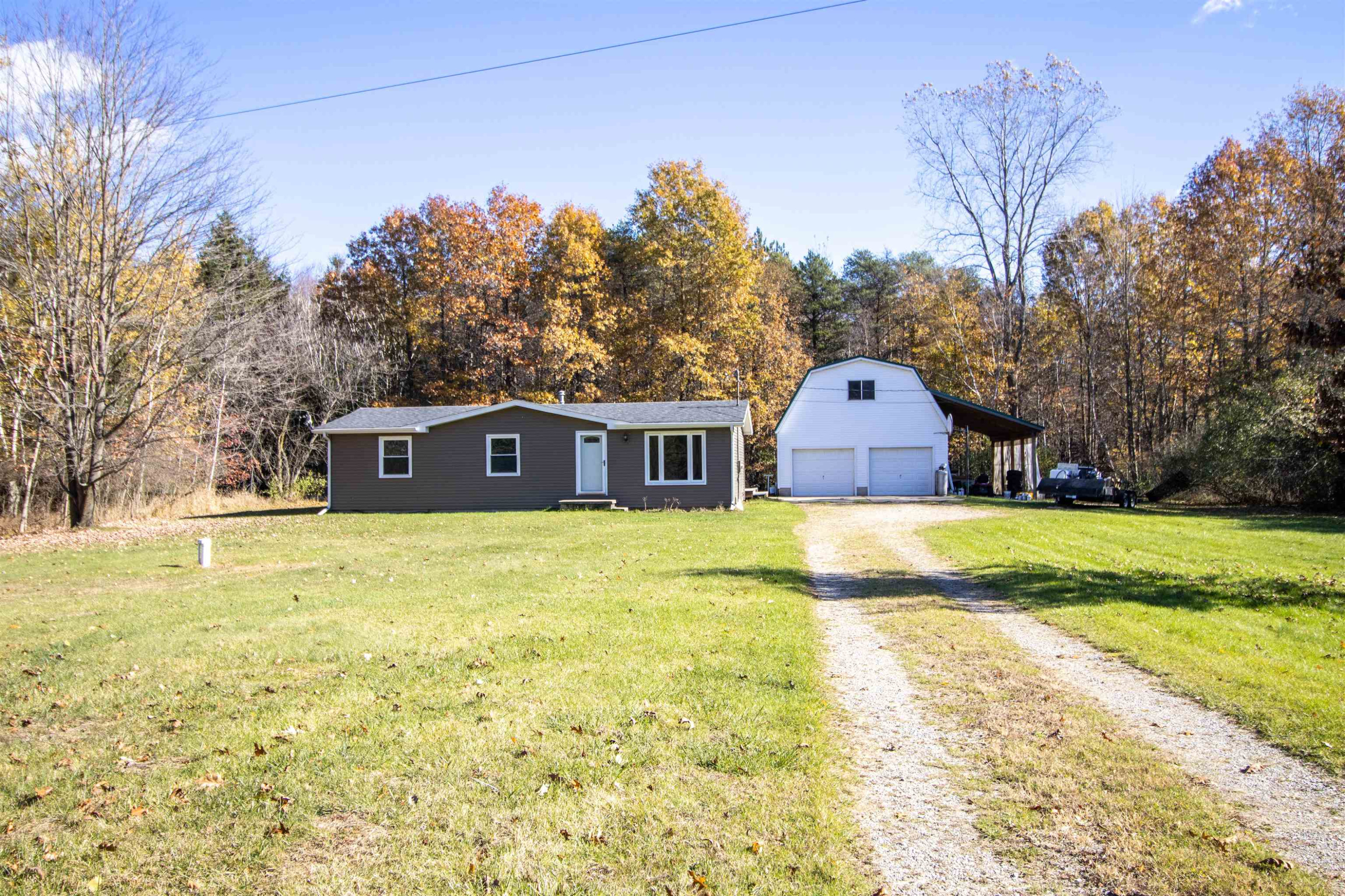 12091 S Meridian Road, Brant, MI 48614 — front exterior