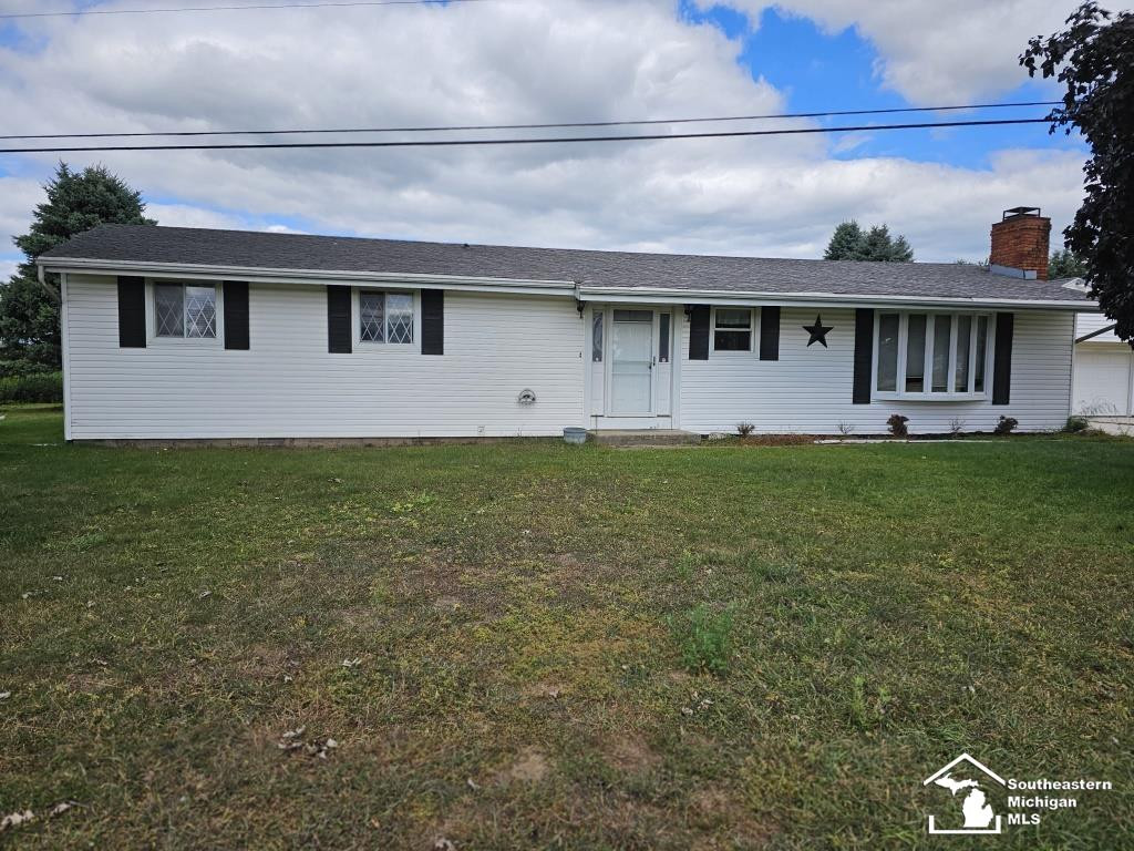 5724 Consear Road, MI 49267 — front exterior
