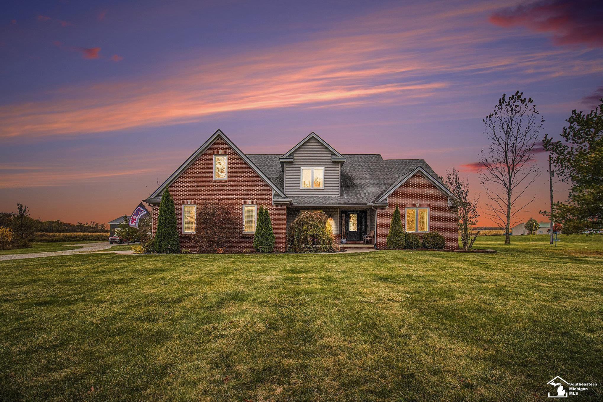 8233 Sylvania Petersburg Road, MI 49267 — front exterior