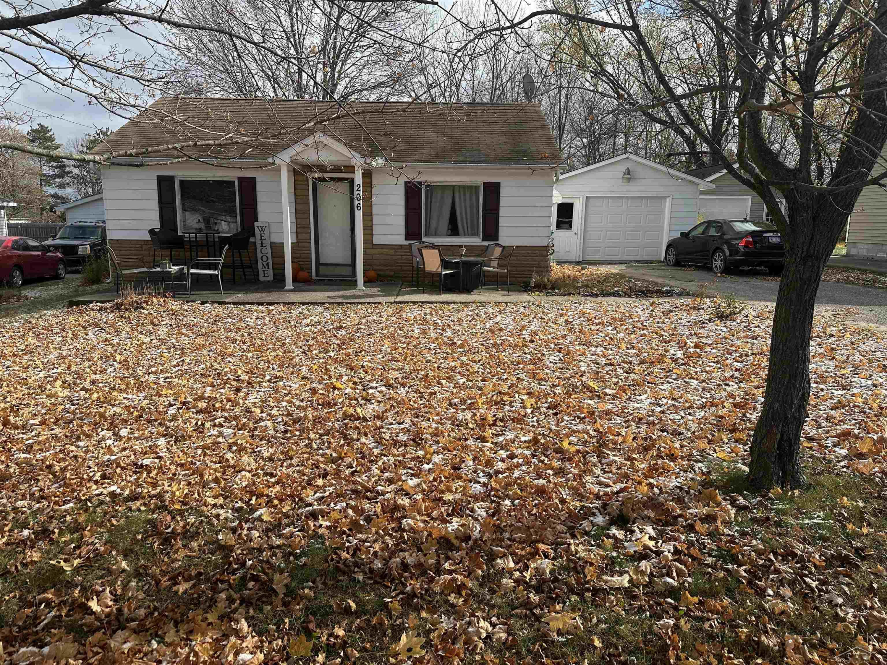 206 Highland Street, West Branch, MI 48661 — front exterior