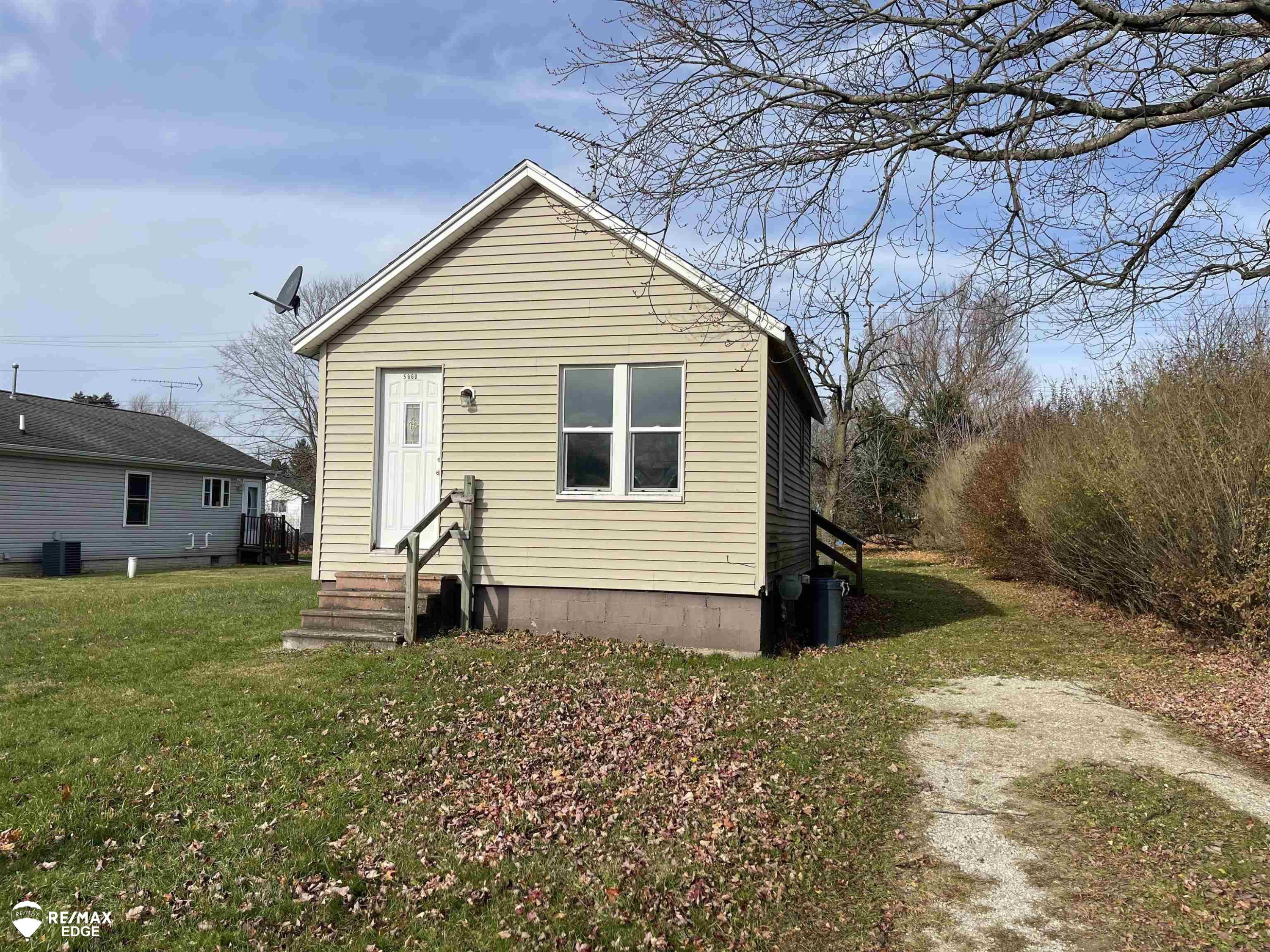 5660 Benson Avenue, Otter Lake, MI 48464 — front exterior
