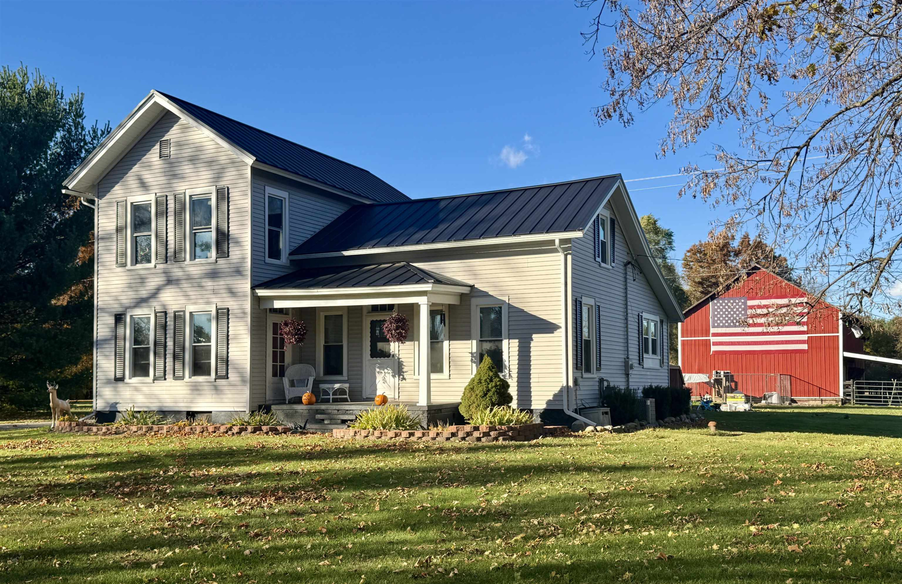 7684 W Beard Road, Perry, MI 48872 — front exterior