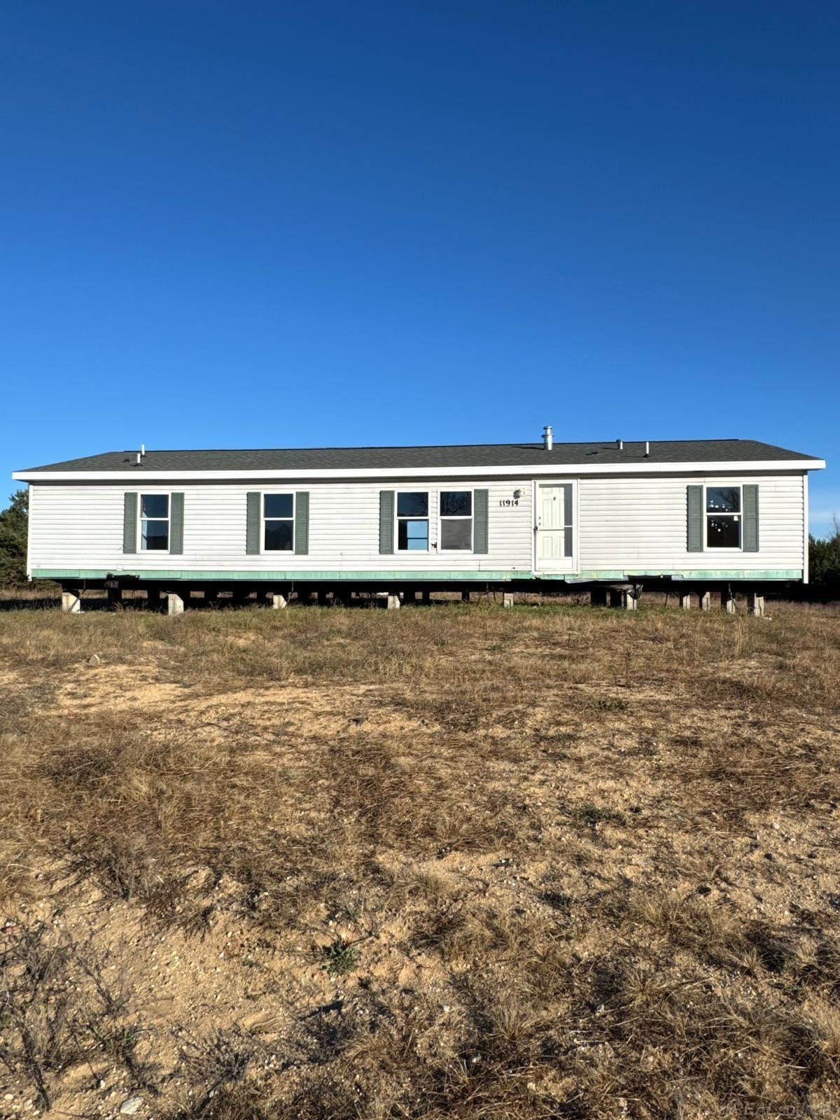 8155 Cedar River Road, Mancelona, MI 49659 — front exterior
