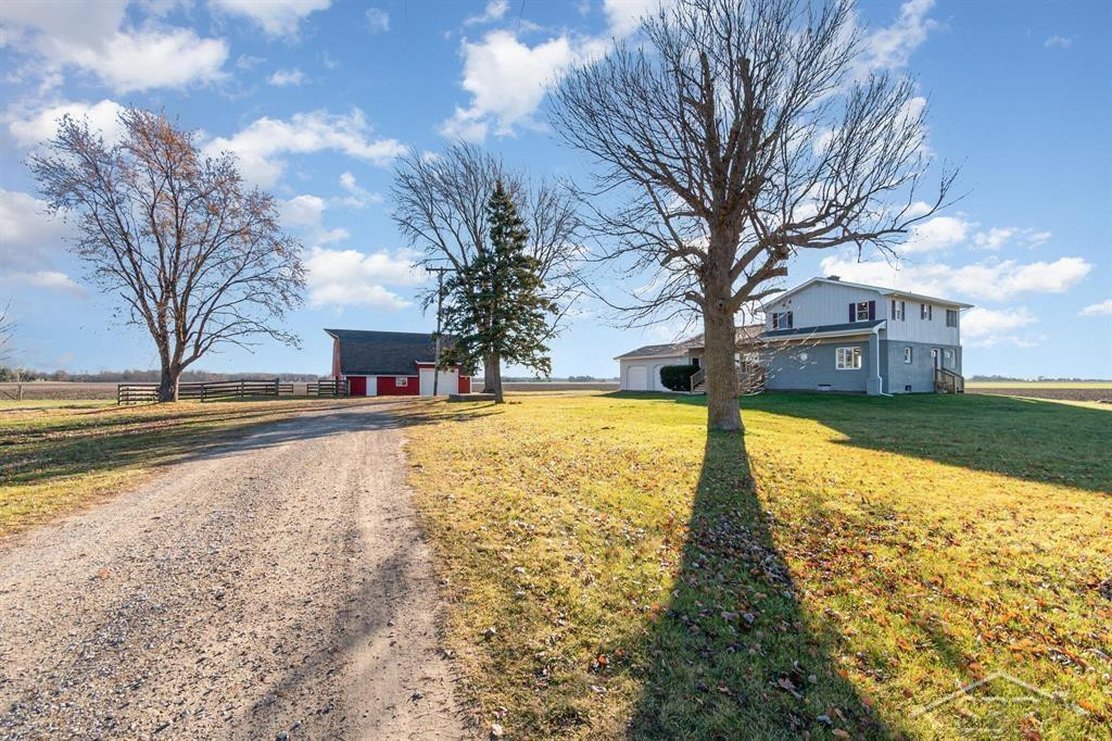 4079 S Eight Mile Road, Auburn, MI 48611 — front exterior