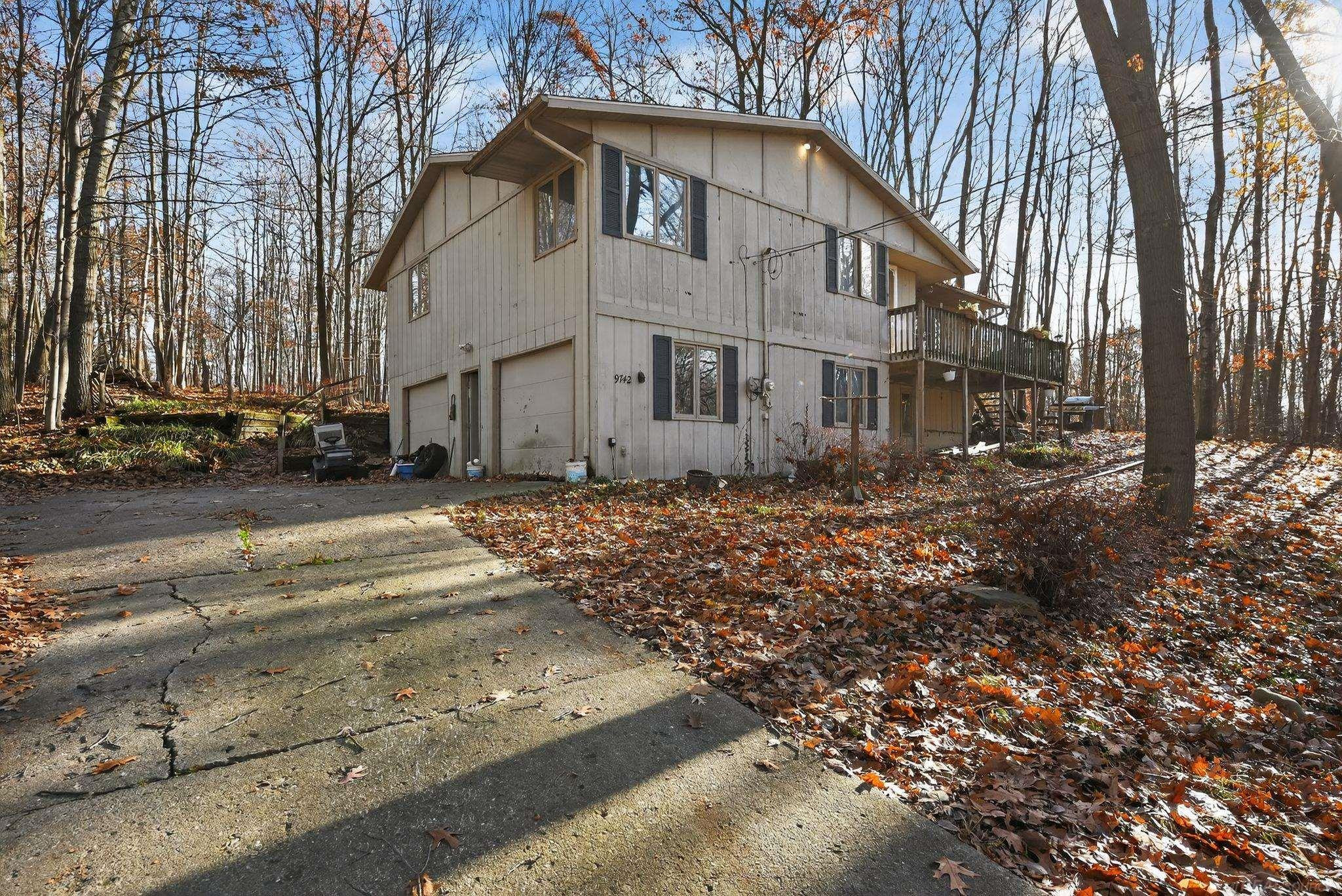 9742 Golf Port Drive, Stanwood, MI 49346 — front exterior