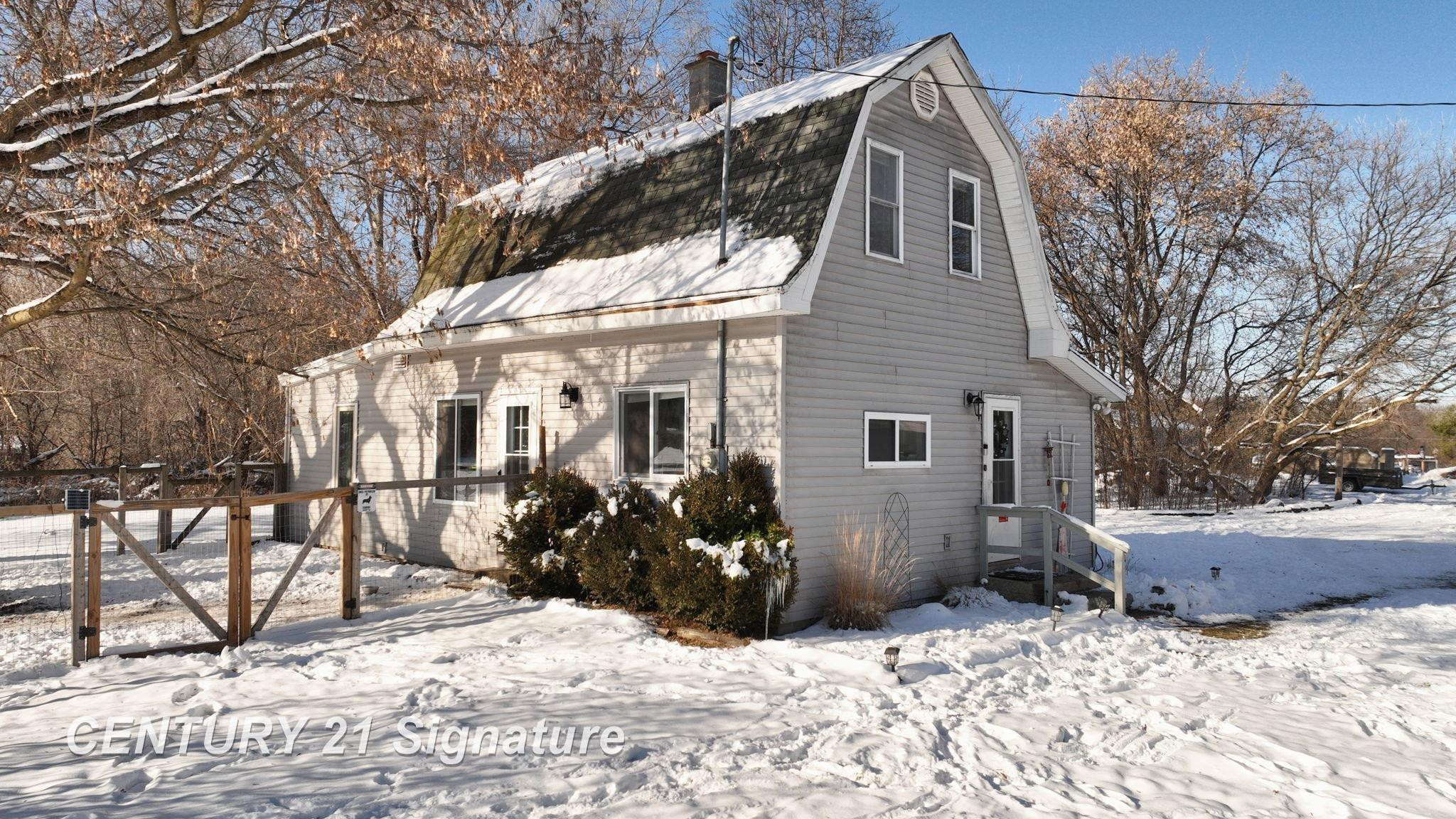 6721 N Neiner Road, Beaverton, MI 48612 — front exterior
