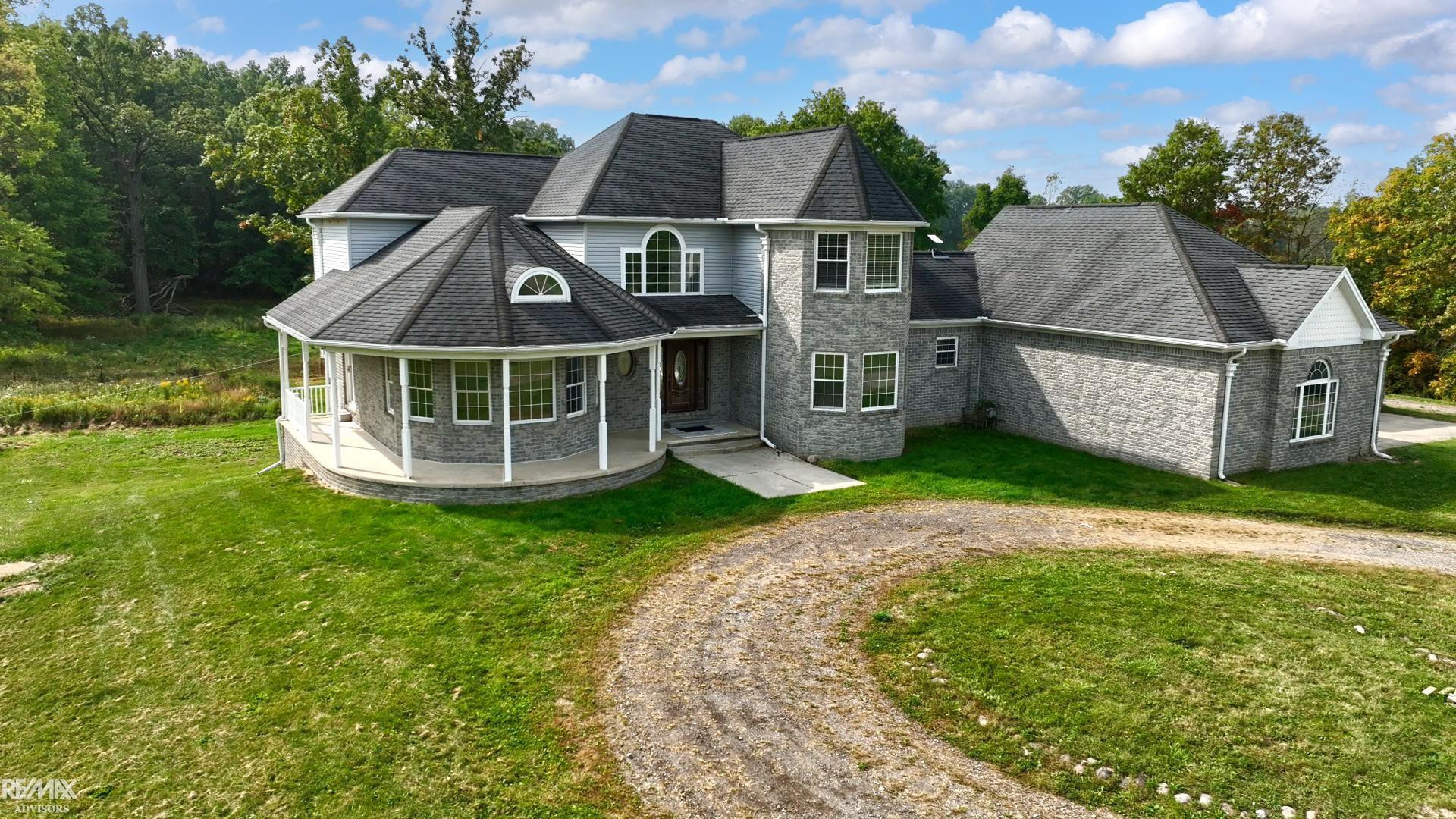 7791 Arnold Road, MI — front exterior
