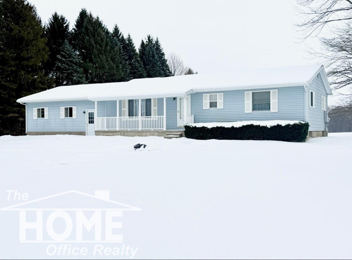 2401 W Beard Road, Perry, MI 48872 — front exterior