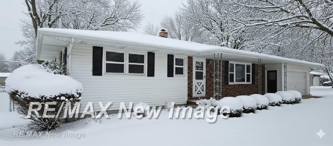 705 E Liberty Street, Chesaning, MI 48616 — front exterior